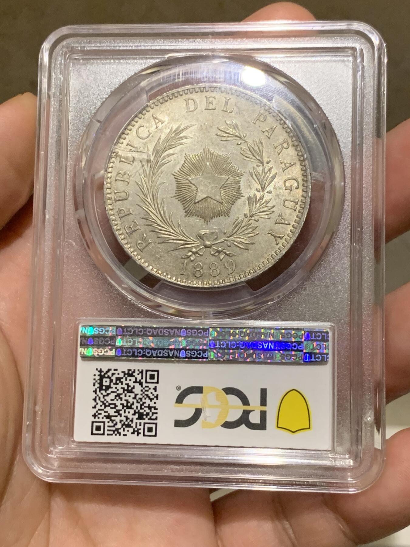 《竞宝斋》第289场- 周日，周一，周二 3场连拍 （全场包邮） PCGS MS62 巴拉圭1889年雄狮1比索大银币 名誉品 原味包浆带转光 上MS的极少 背面一划痕在盒子上