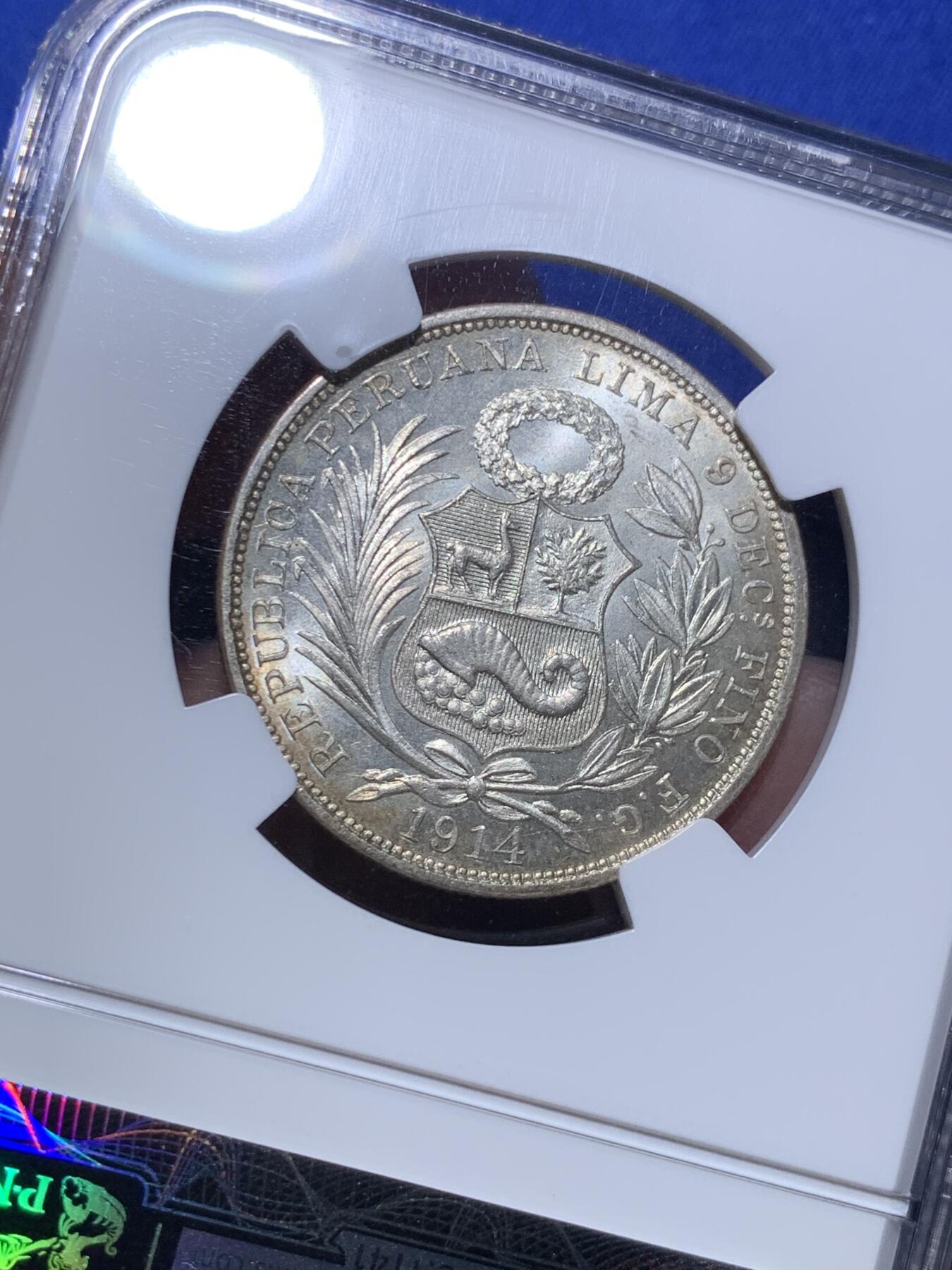 《竞宝斋》第289场- 周日，周一，周二 3场连拍 （全场包邮） NGC MS64 秘鲁1914年坐人女神半索尔银币 半圆大小，经典女神坐像。卷首币，正面浓郁深五彩，背面银光粉润，老N盒严评