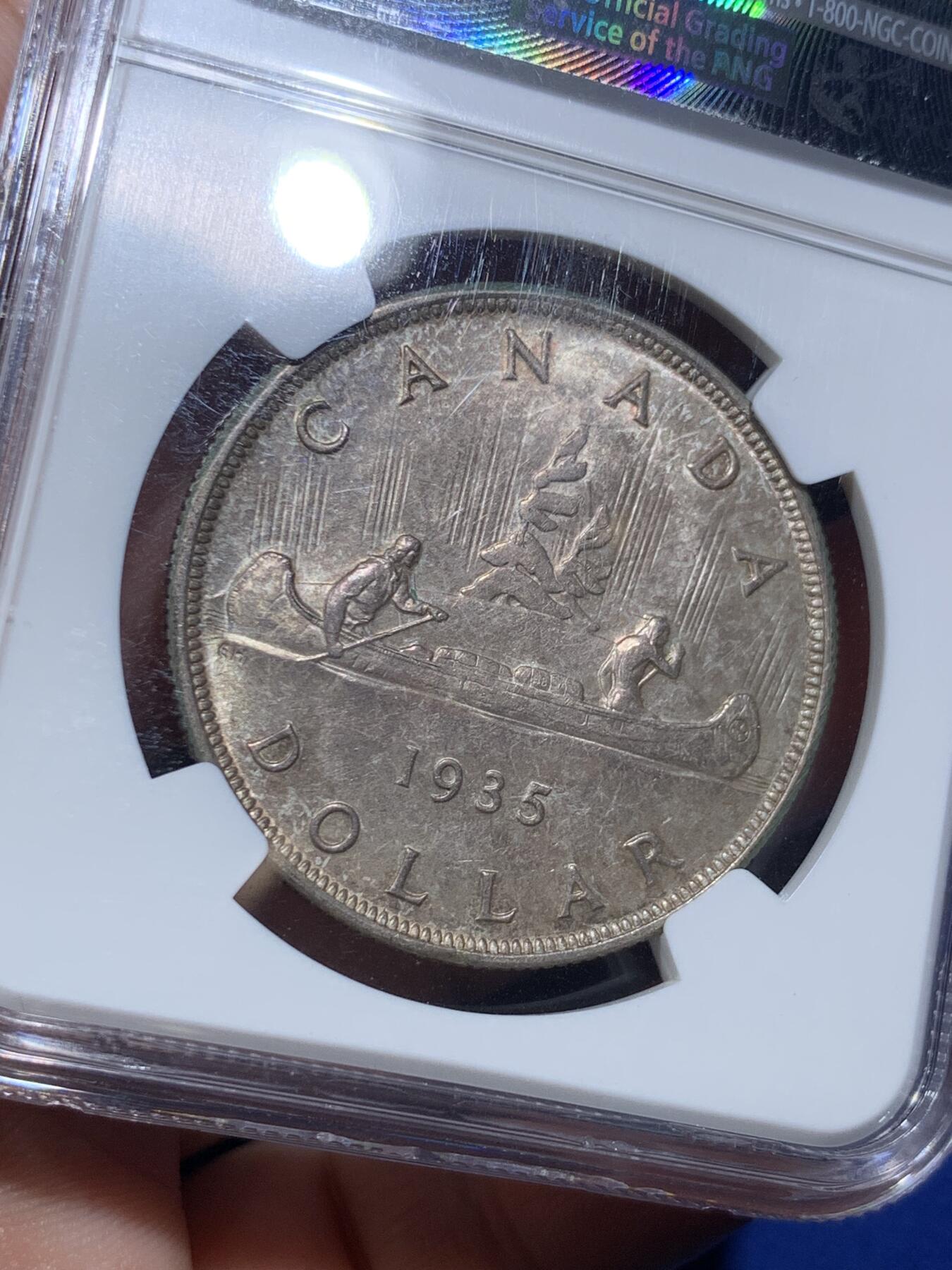 《竞宝斋》第289场- 周日，周一，周二 3场连拍 （全场包邮） NGC-MS64 英属加拿大1935年乔治五世1元划船大银币 包浆很漂亮 