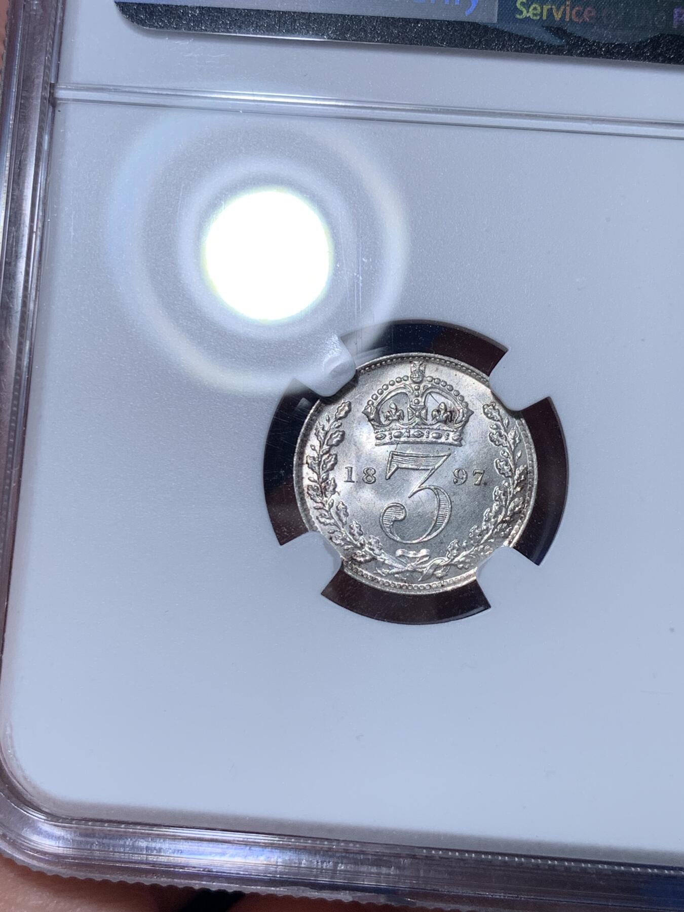 《竞宝斋》第289场- 周日，周一，周二 3场连拍 （全场包邮） NGC MS63 英国1897年维多利亚3便士 带有凝霜感的转光 氧化黑点导致上海N仅给出63分