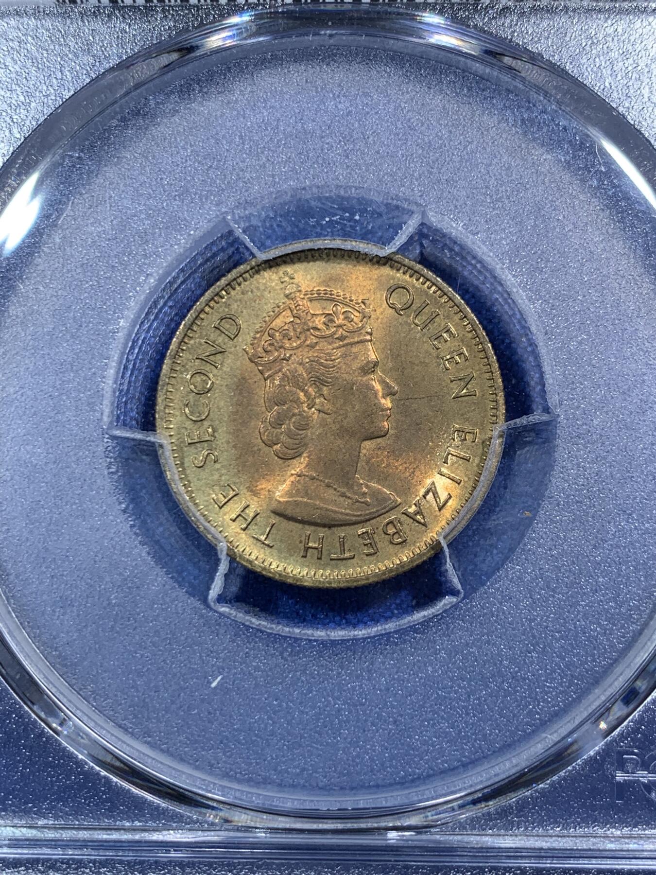 《竞宝斋》第289场- 周日，周一，周二 3场连拍 （全场包邮） PCGS MS65 香港1980一毫 特年名誉品 这个品种很容易有胶水痕迹 这枚币面干净没有胶水印 非常少见