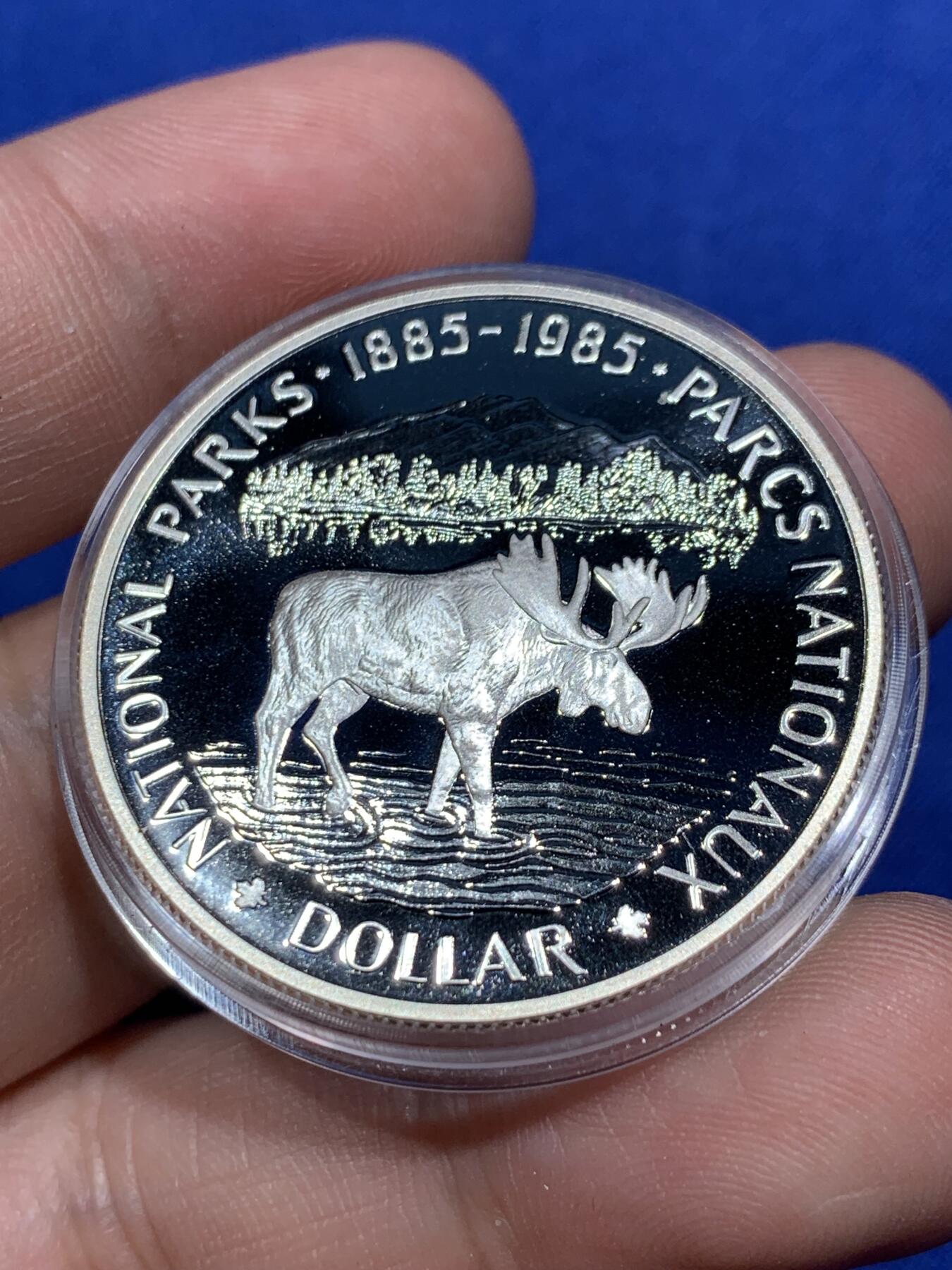 《竞宝斋》第290场- 周日，周一，周二 3场连拍 （全场包邮） 加拿大1985年麋鹿一元精制银币