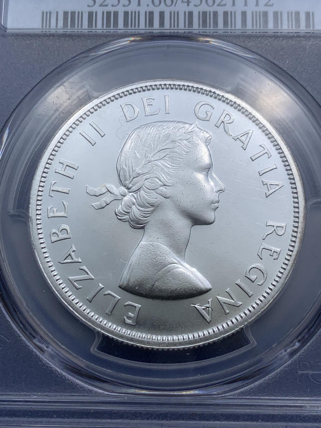 《竞宝斋》第290场- 周日，周一，周二 3场连拍 （全场包邮） PCGS PL66 加拿大1962划船一元银币