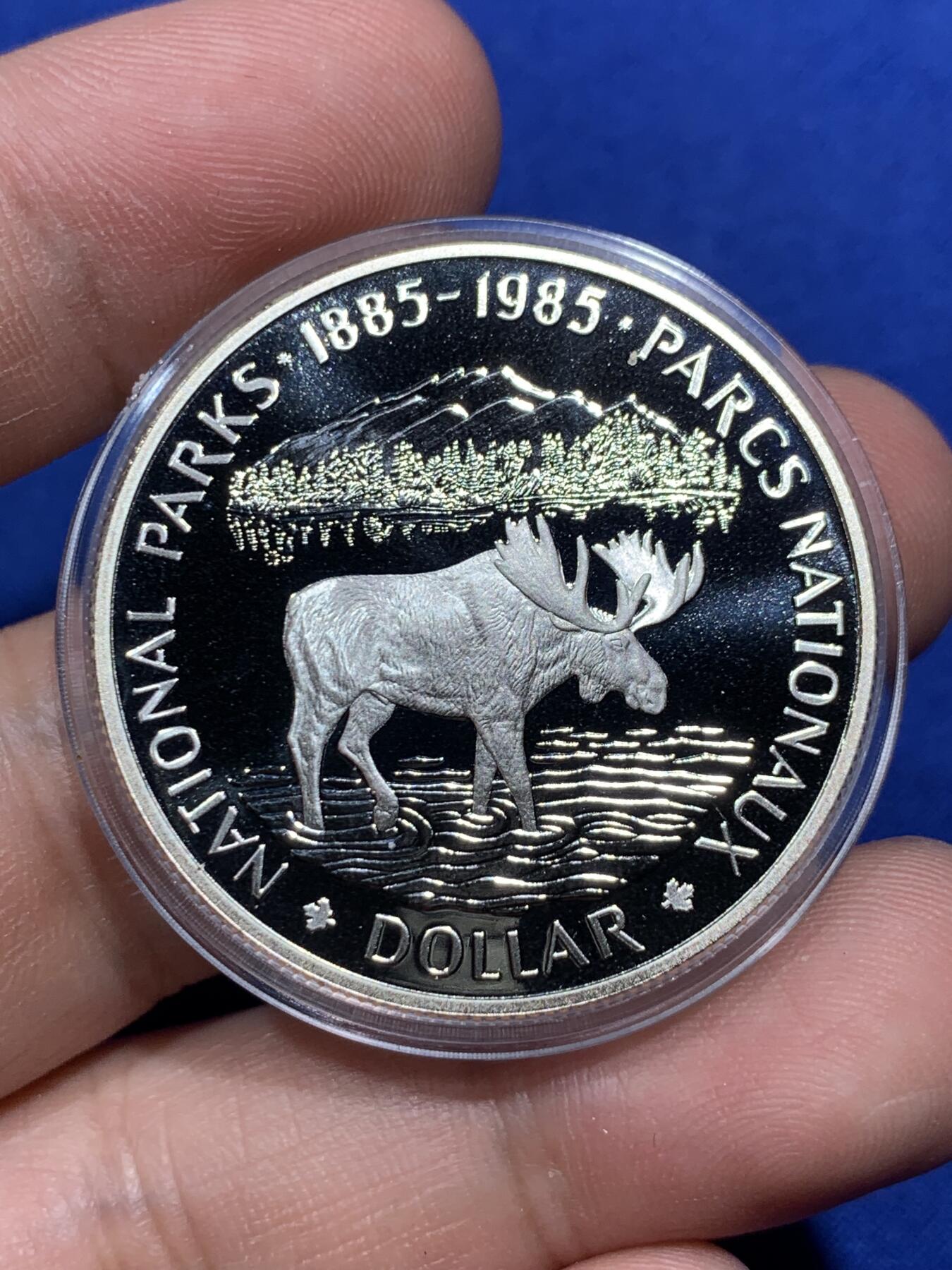 《竞宝斋》第290场- 周日，周一，周二 3场连拍 （全场包邮） 加拿大1985年麋鹿一元精制银币