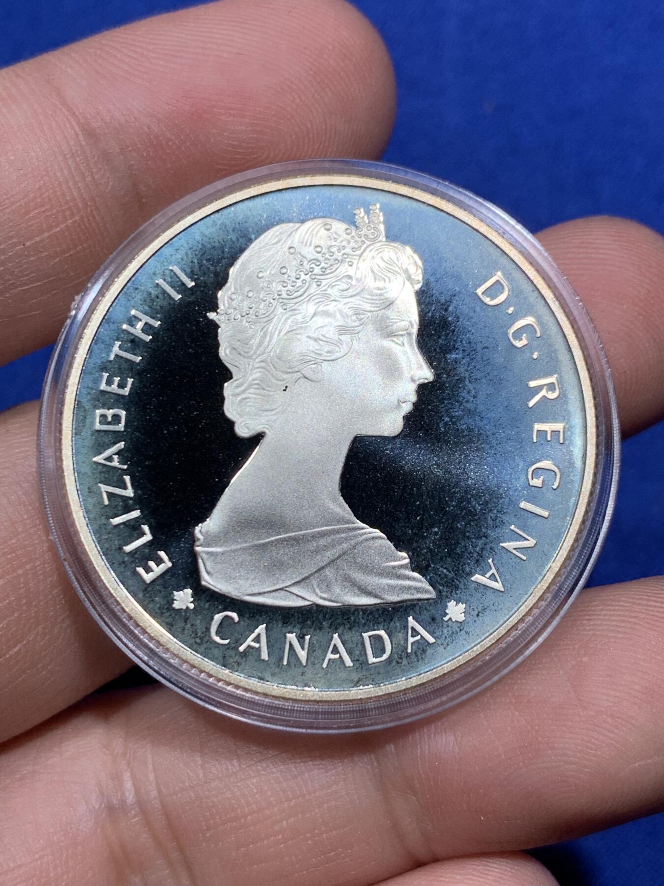 《竞宝斋》第290场- 周日，周一，周二 3场连拍 （全场包邮） 加拿大1985年麋鹿一元精制银币