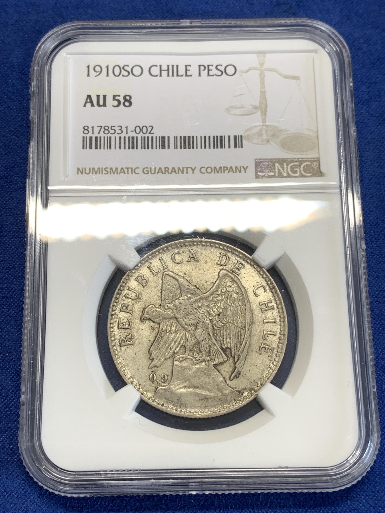 《竞宝斋》第290场- 周日，周一，周二 3场连拍 （全场包邮） NGC AU58 智利1910年1比索高银版银币 安第斯山脉的神鹫 章牌大师O.Roty的作品 羽翼丰满 底光充沛