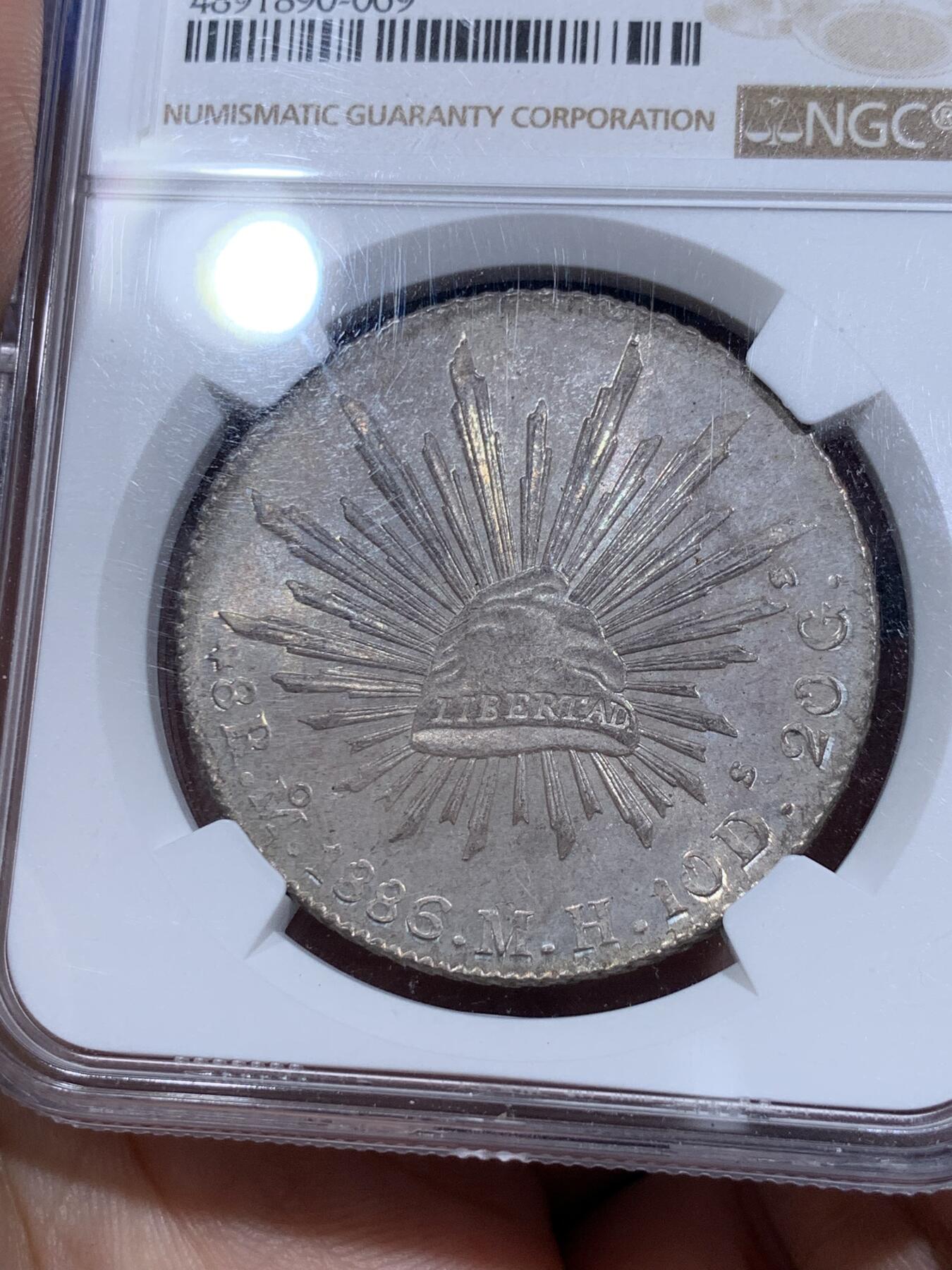 《竞宝斋》第290场- 周日，周一，周二 3场连拍 （全场包邮） NGC MS65 墨西哥1886年花边鹰洋 彩虹底板包浆 高分好品