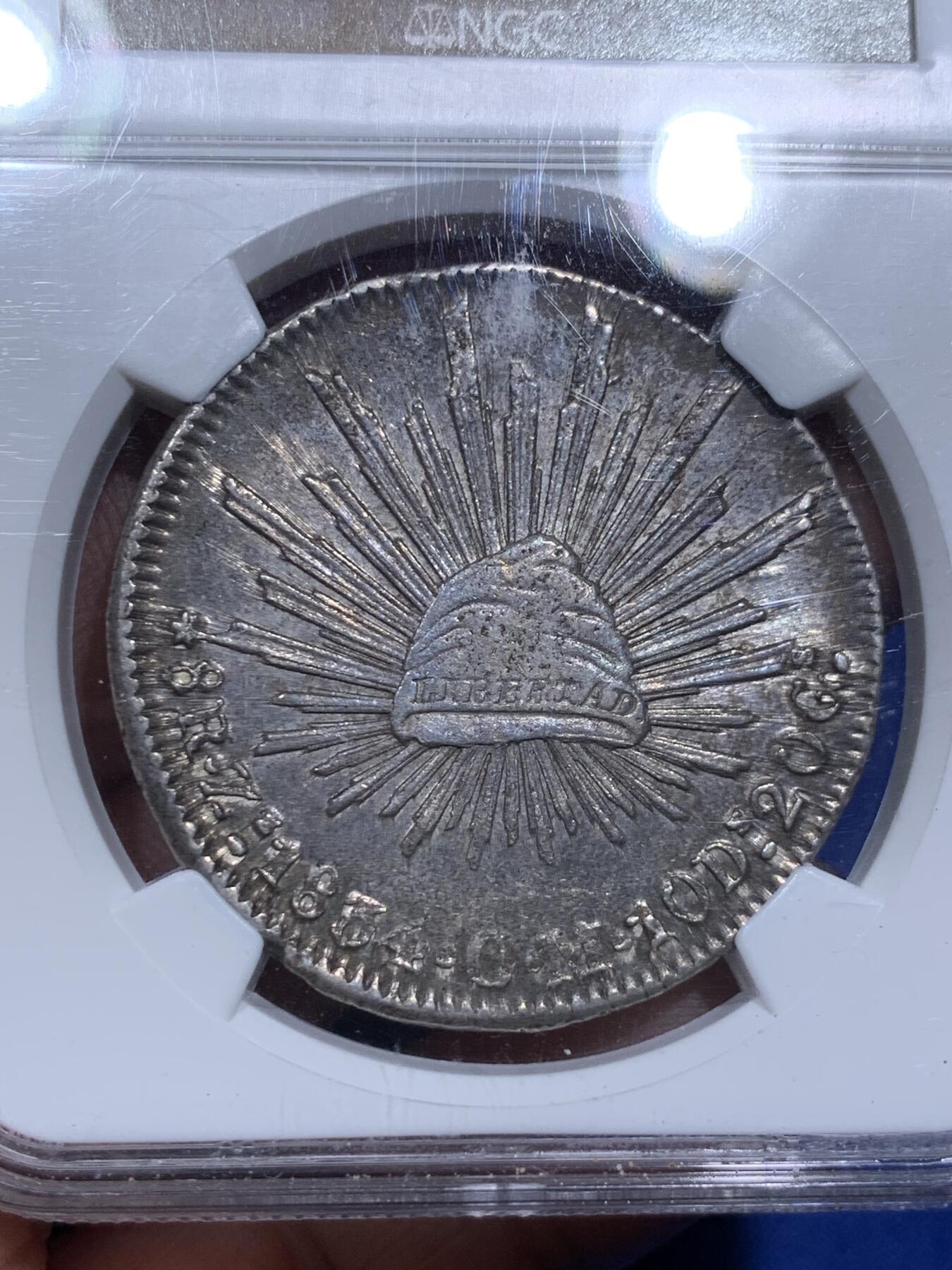 《竞宝斋》第290场- 周日，周一，周二 3场连拍 （全场包邮） NGC AU55 墨西哥1834年早期鹰洋 章型币 稀见早期肥鹰 鹰羽仙人掌细节不错，入骨深五彩，美不胜收。老N盒品质保障，状态超越分数