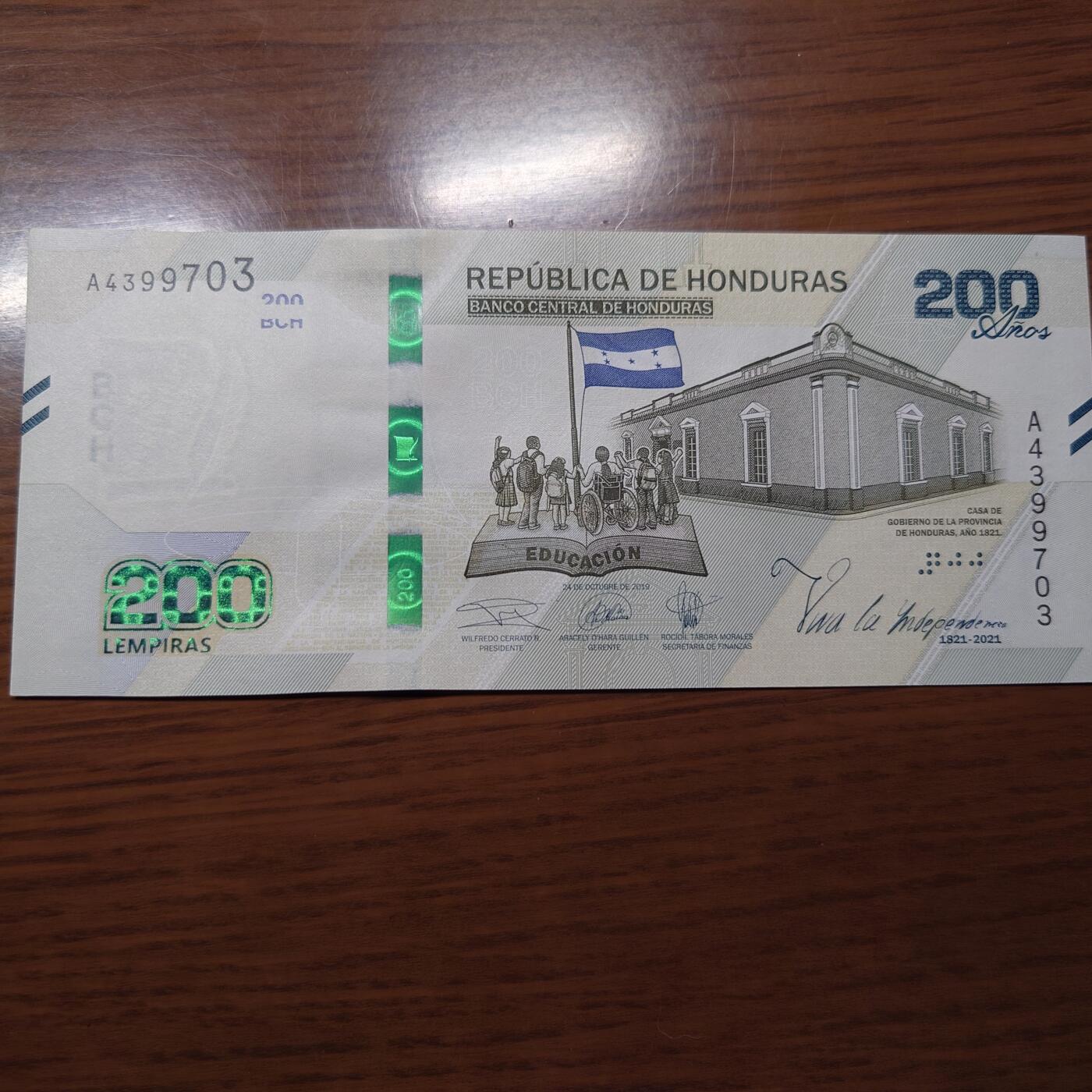 【世界钱币】精选微拍第121期暨2024年第32期  部分新品卖剩 2021年洪都拉斯200 纪念钞 全新绝品尾号703