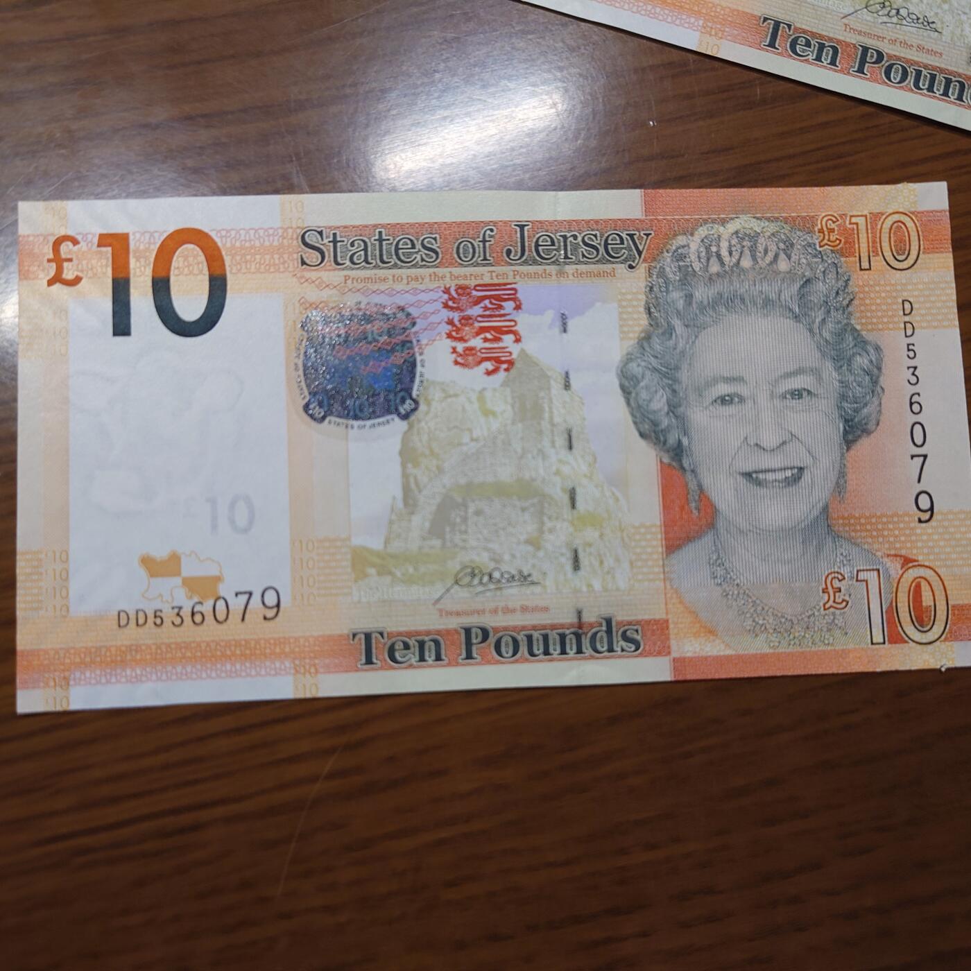 【世界钱币】精选微拍第121期暨2024年第32期  部分新品卖剩 2010年泽西岛10镑 全新绝品无4尾号079