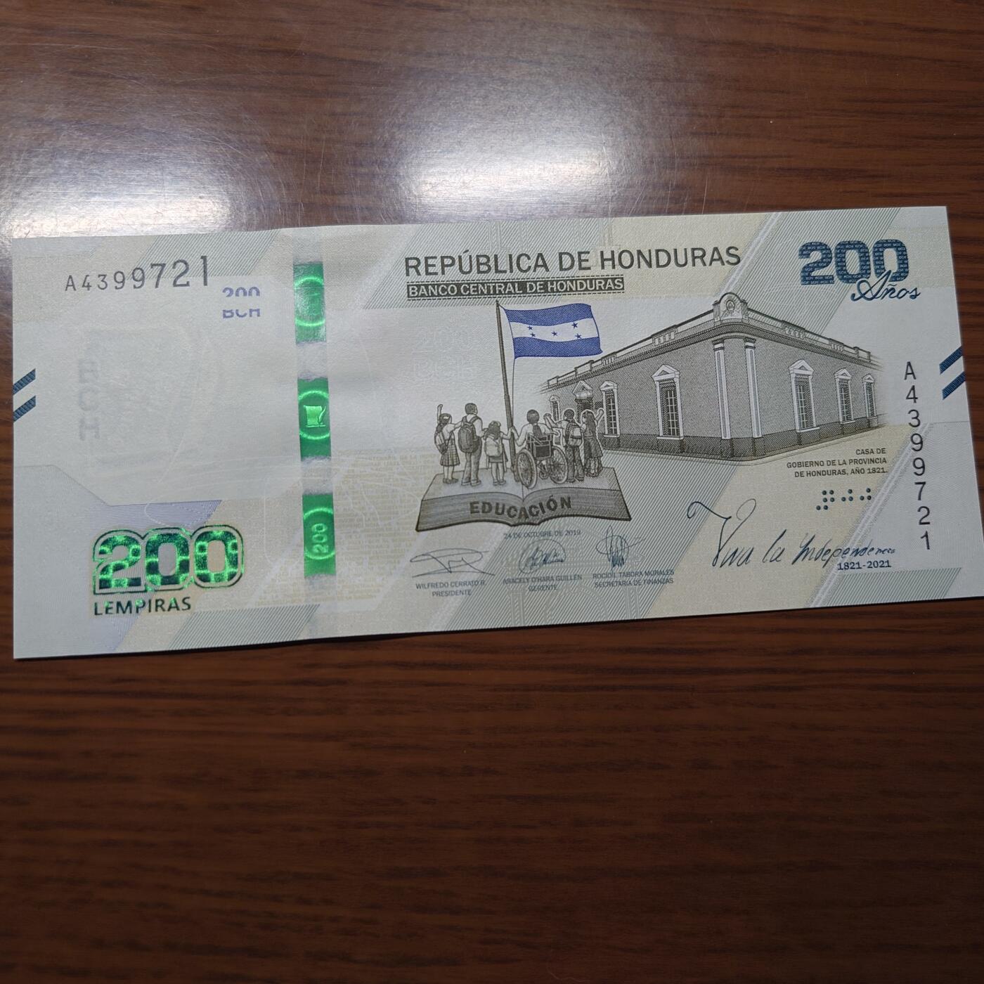 【世界钱币】精选微拍第121期暨2024年第32期  部分新品卖剩 2021年洪都拉斯200 纪念钞 全新绝品尾号721
