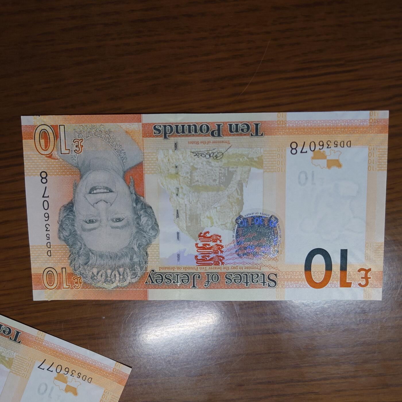 【世界钱币】精选微拍第121期暨2024年第32期  部分新品卖剩 2010年泽西岛10镑 全新绝品无4尾号078