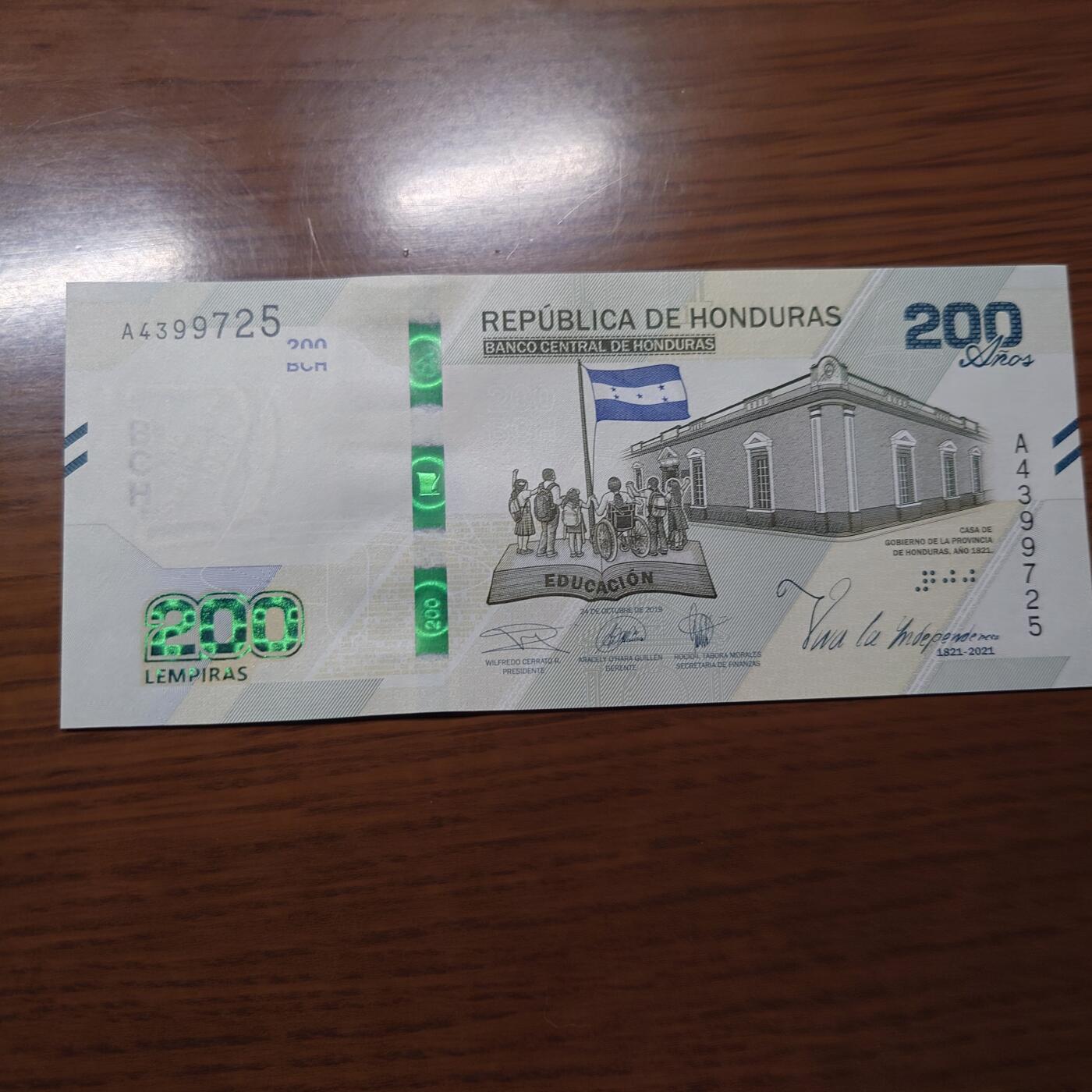 【世界钱币】精选微拍第121期暨2024年第32期  部分新品卖剩 2021年洪都拉斯200 纪念钞 全新绝品尾号725