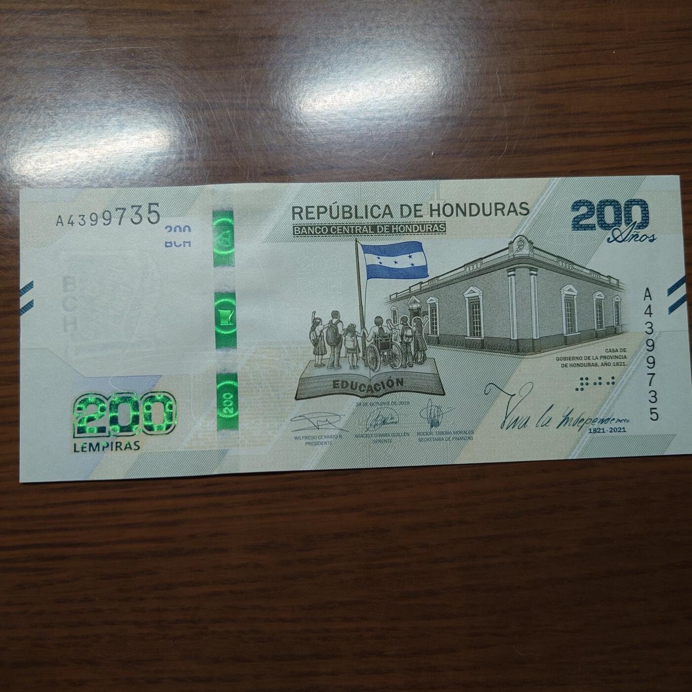 【世界钱币】精选微拍第121期暨2024年第32期  部分新品卖剩 2021年洪都拉斯200 纪念钞 全新绝品尾号735
