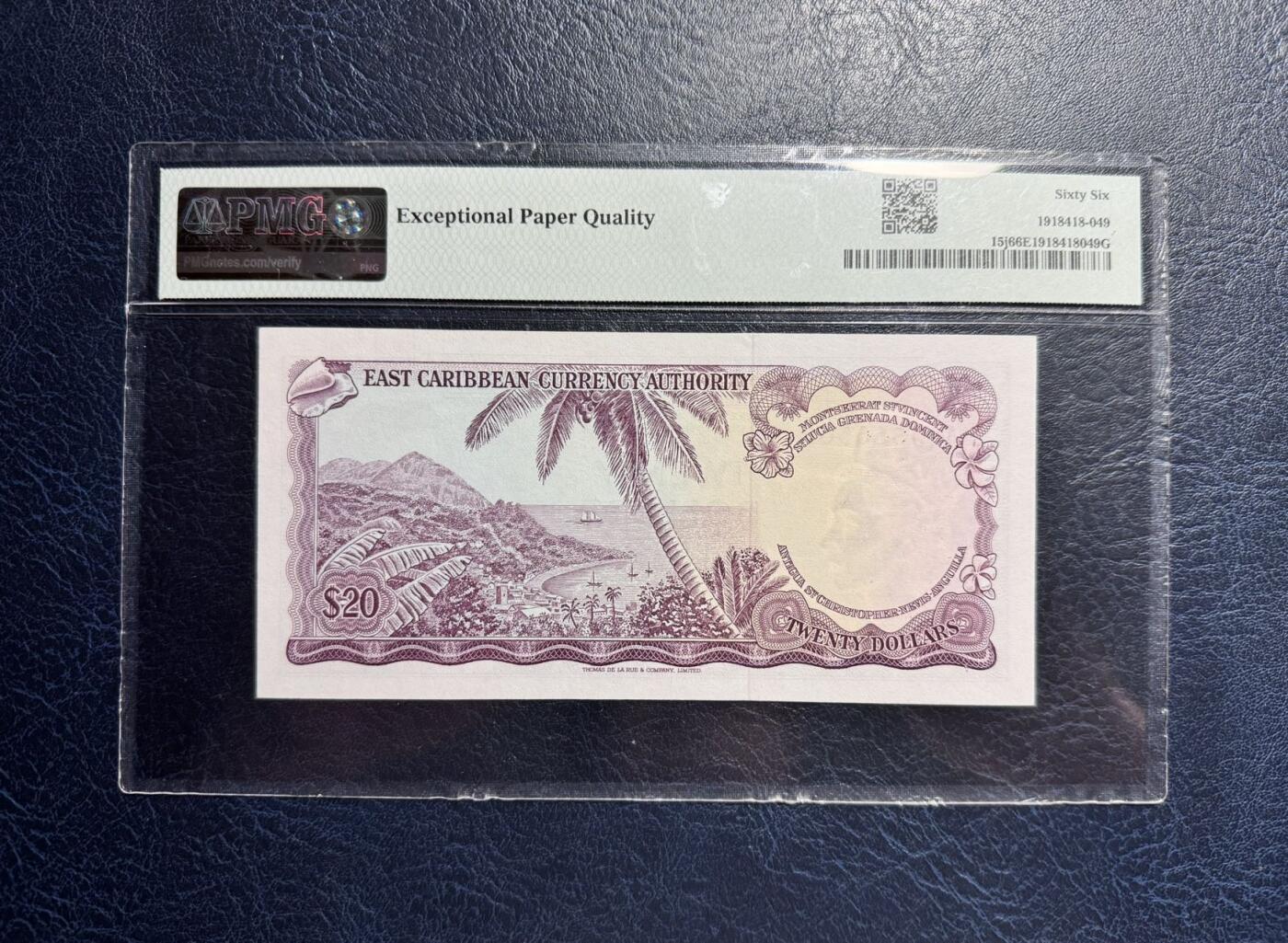 收藏联盟Quantum Auction 第363期拍卖  东加勒比地区/格林纳达1965年20元 PMG66 号码无47 豹子号身