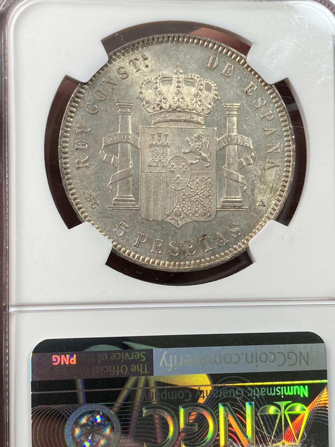 万国钱币拍卖第030期（万国三十期纪念大拍） NGC MS63 1899年西班牙阿方索十三世小孩头5比塞塔大银币 流通非常充分的品种 淡金彩包浆