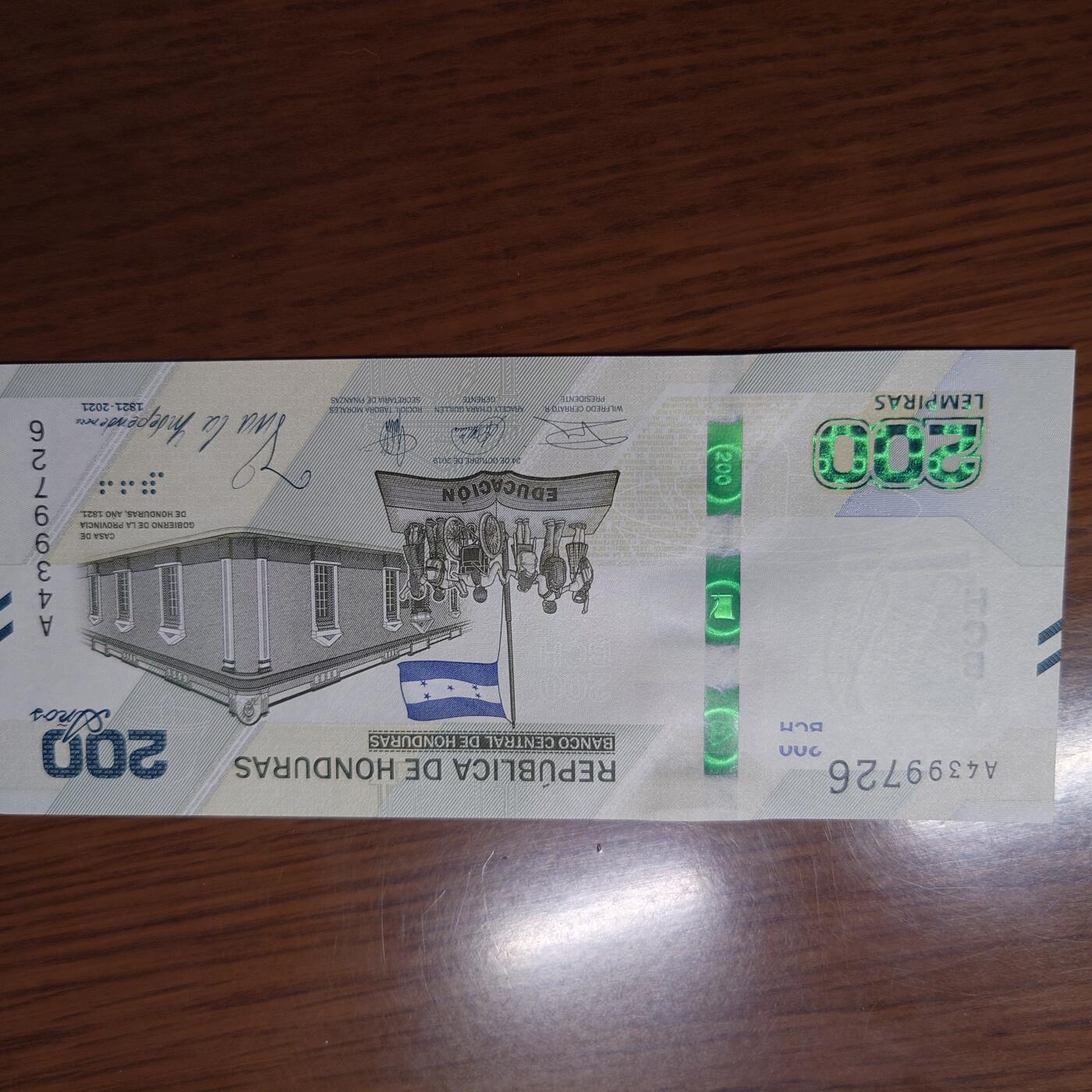 【世界钱币】精选微拍第121期暨2024年第32期  部分新品卖剩 2021年洪都拉斯200 纪念钞 全新绝品尾号726