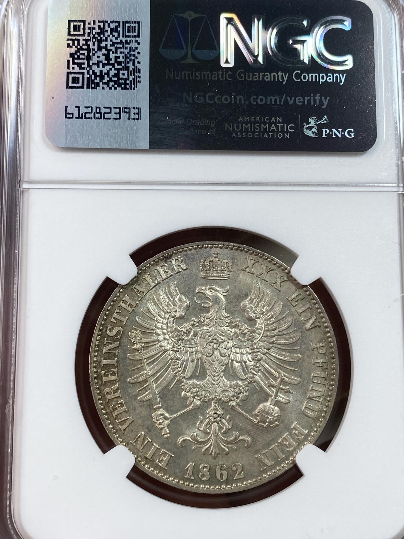 万国钱币拍卖第030期（万国三十期纪念大拍） NGC MS64 1862年德国普鲁士威廉一世离冠鹰流通1泰勒 威廉加冕第二年承继的离冠鹰流通泰勒 霜感与光度并列 原味与十字转光并存 完美一步到位的收藏品质