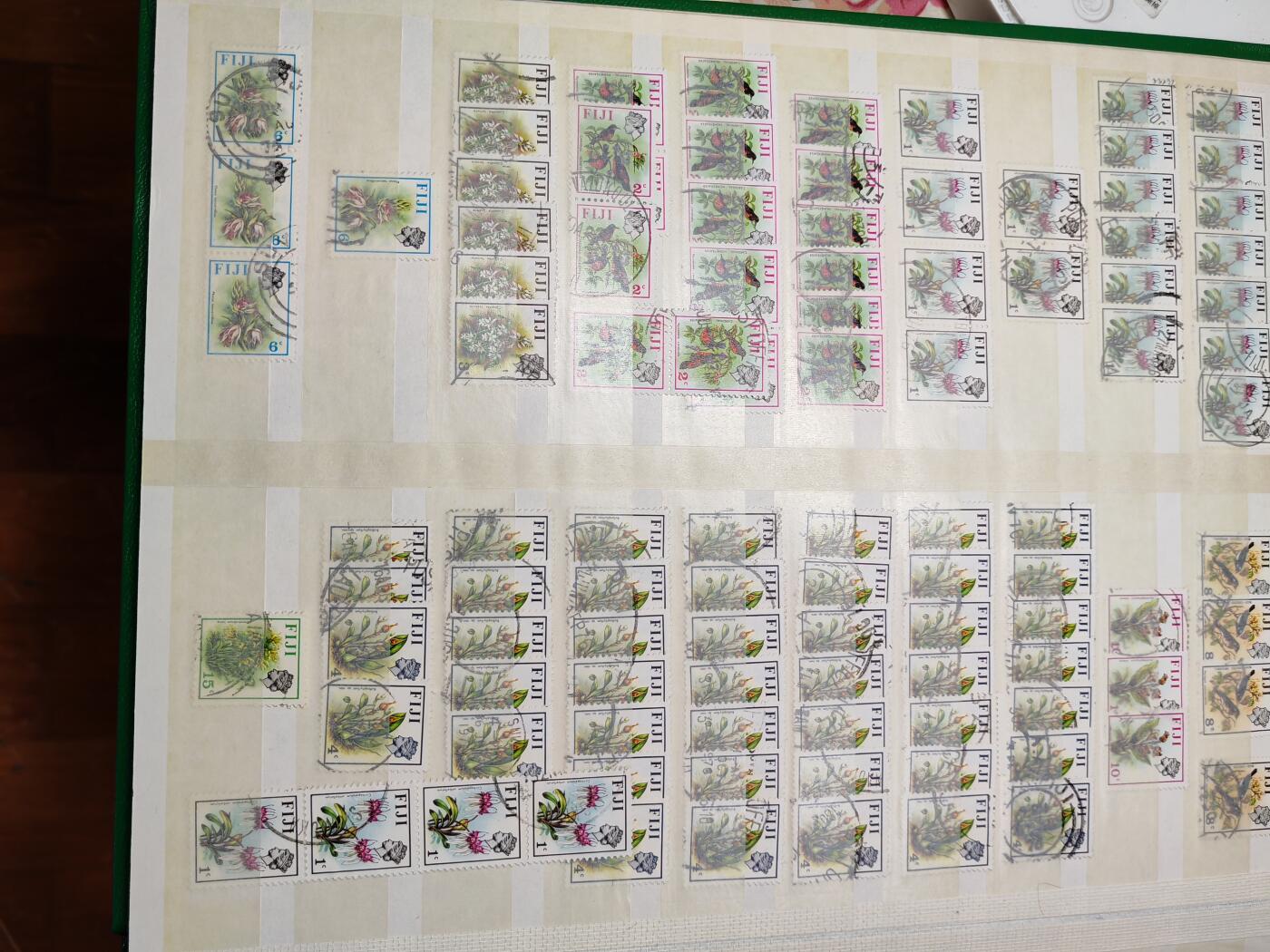 长老汇龙年精选第十一场拍卖（币中币） 斐济等英国原太平洋殖民地邮票册一本，7页14面，新旧混合