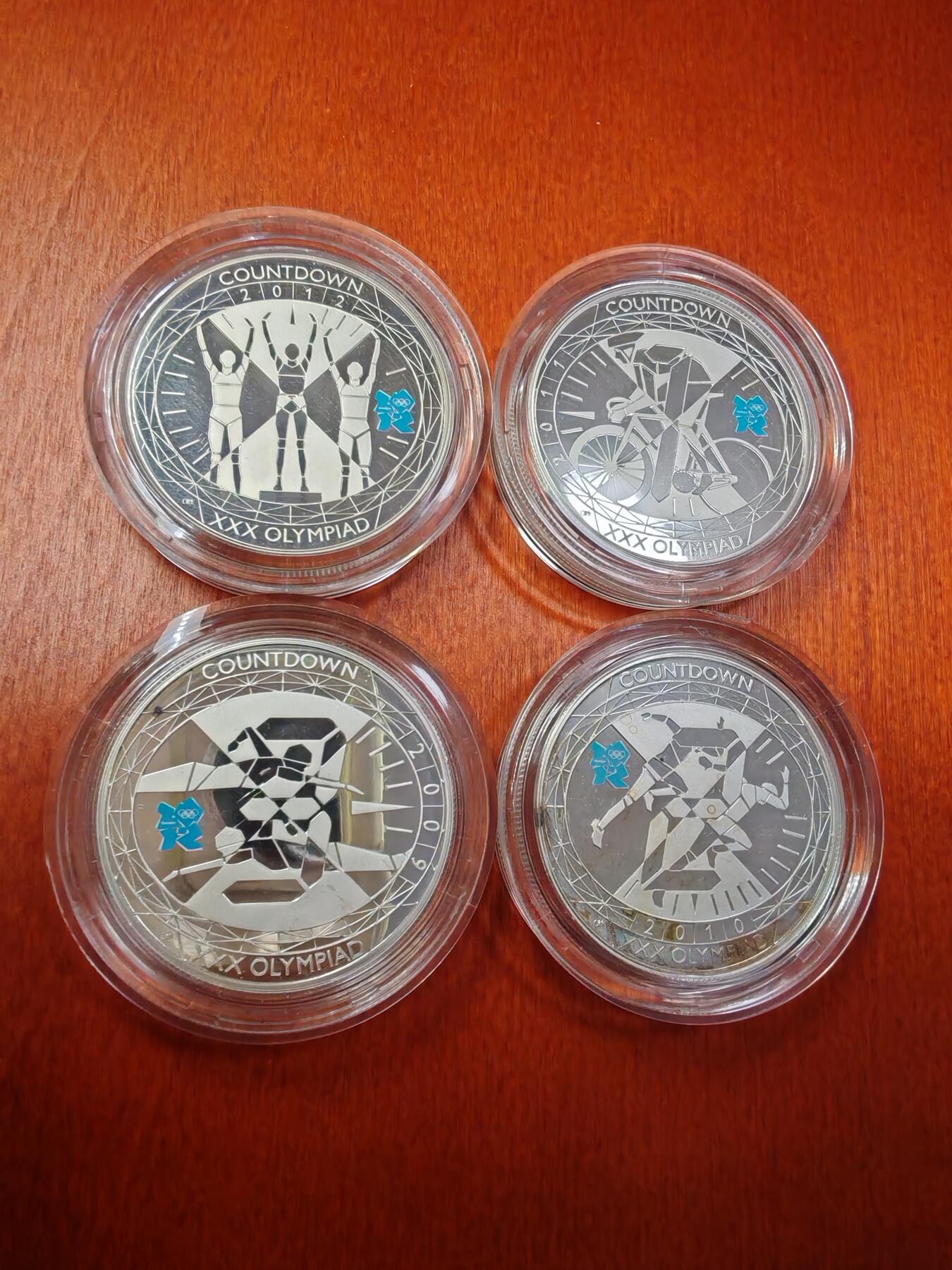 长老汇龙年精选第十二场拍卖（满分进行曲） 2009-2012英国伦敦奥运会倒计时4枚套装——5英镑局部彩色加厚精制银币，1枚56.56克925银，盒证全