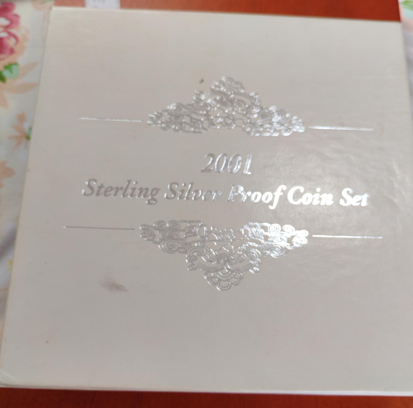长老汇龙年精选第十二场拍卖（满分进行曲） 2001新加坡胡姬花7枚全银精制银币套装，1分到5元，盒证全，造币厂承诺回购价不低于124新加坡元，目前1新元约等于5.4人民币