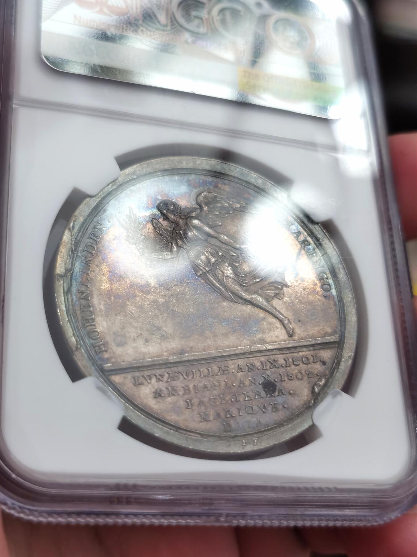 博洋堂“夏光旖旎”7月精品专场暨第085期（全场包邮） NGC MS62 法国1802年拿破仑一世亚眠条约原铸银章，五彩包浆，罕见短发执政头像 ，胜利羽翼女神手持橄榄枝与月桂花环飘逸地在空中飞行，整体画面唯美，设计雕刻精美，亚眠条约结束法国与英国冲突，标志第二次反法联盟最终破产意义重大，稀有品种，18年昆克裸章2880欧元含佣成交