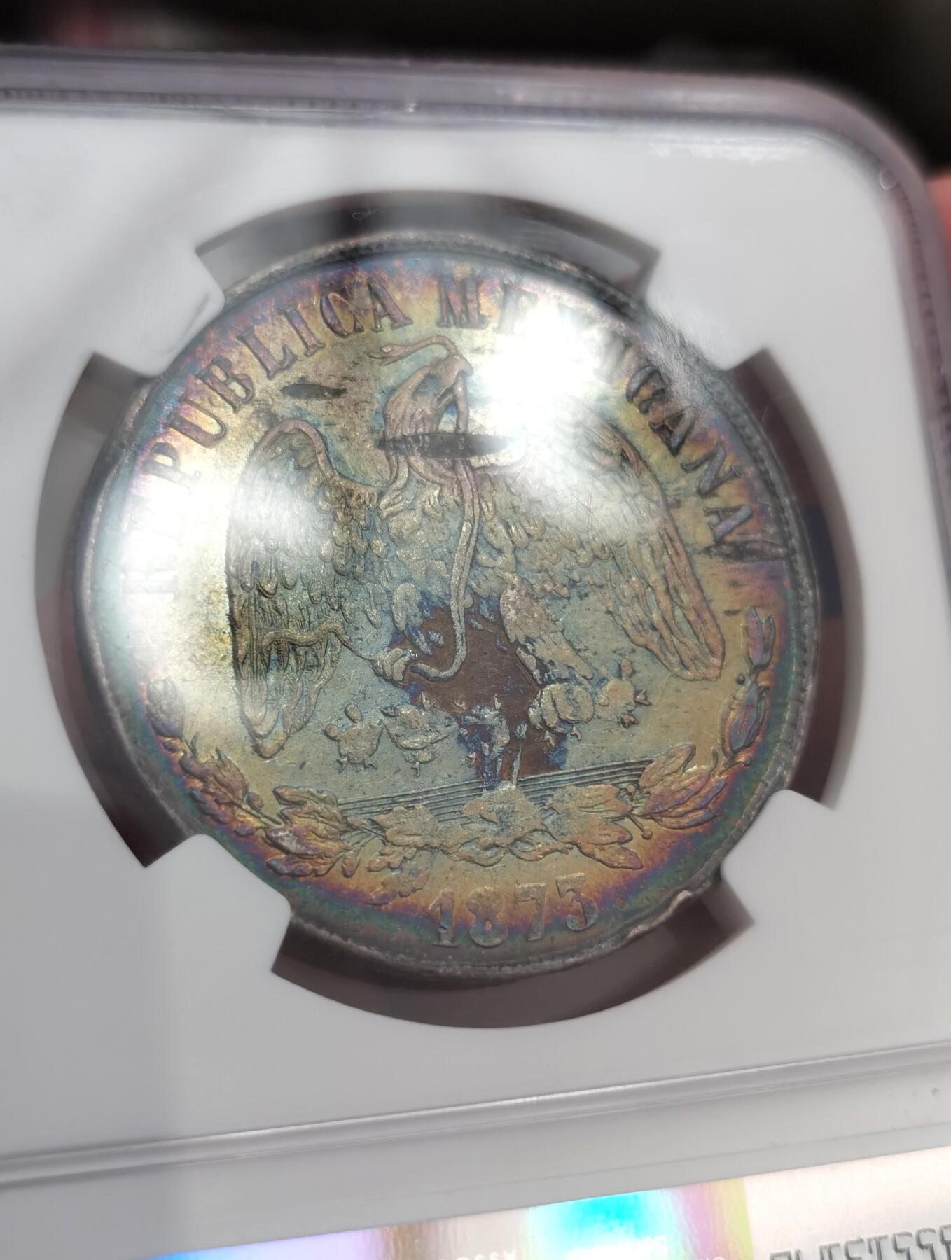 博洋堂“夏光旖旎”7月精品专场暨第085期（全场包邮） NGC AU91 1873年DO P版天平鹰洋银币，非常非常少见的杜兰戈厂天平鹰洋，ngc有分没分的加一起一共只有七枚评级记录。近二十年海外大拍中该品种极其难寻，每出现一枚即会被疯抢。这个品种au无分一共两枚，另一枚au92在今年5月HA的拍卖中528美元成交，此枚原味超级五彩包浆，上海n给AT难以理解，重评大概率有分