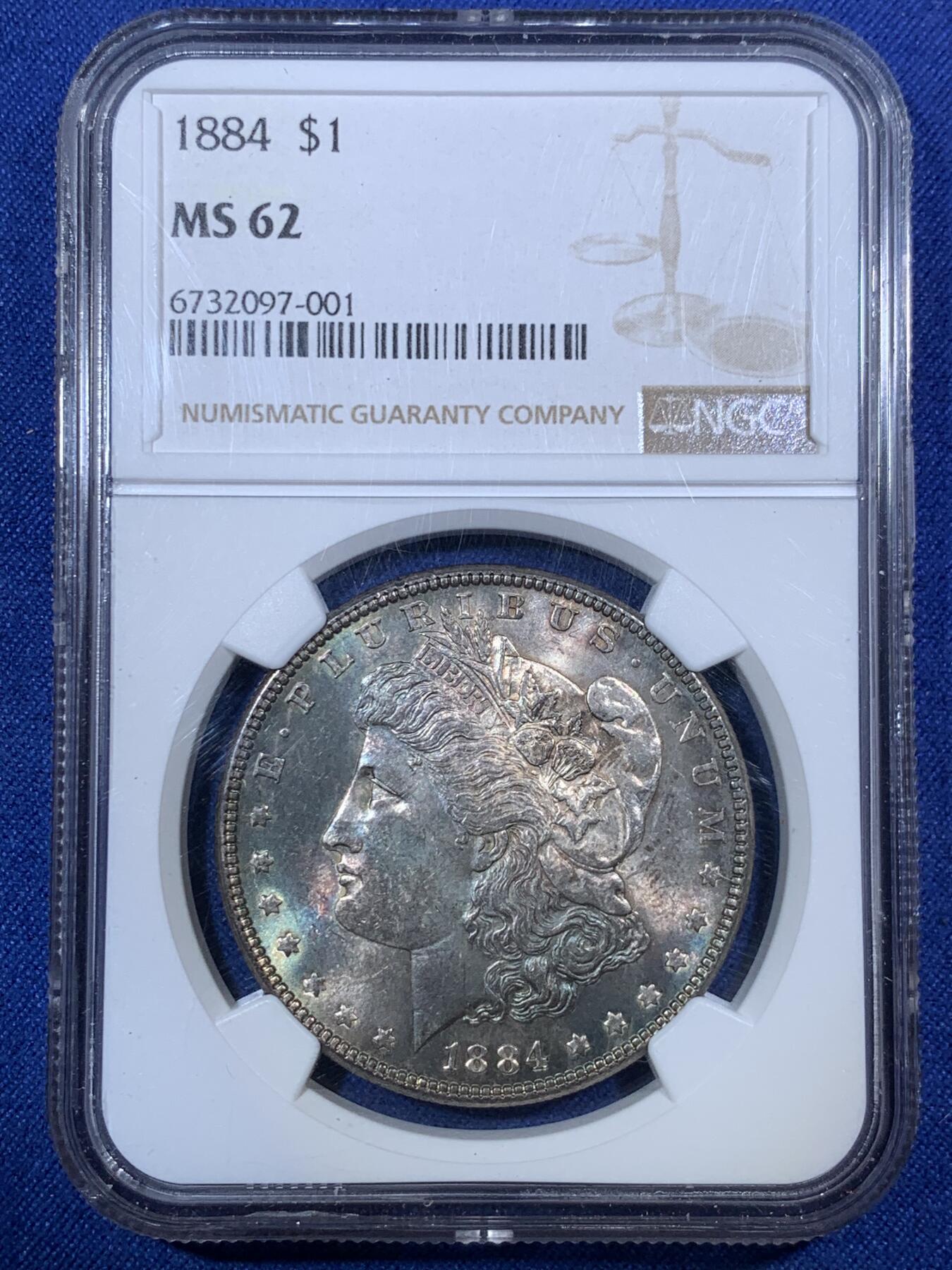 《竞宝斋》第292场- 周日，周一  2场连拍 （全场包邮） NGC MS62 美国 1884年 摩根1美元 孔雀蓝包浆 较少的年份