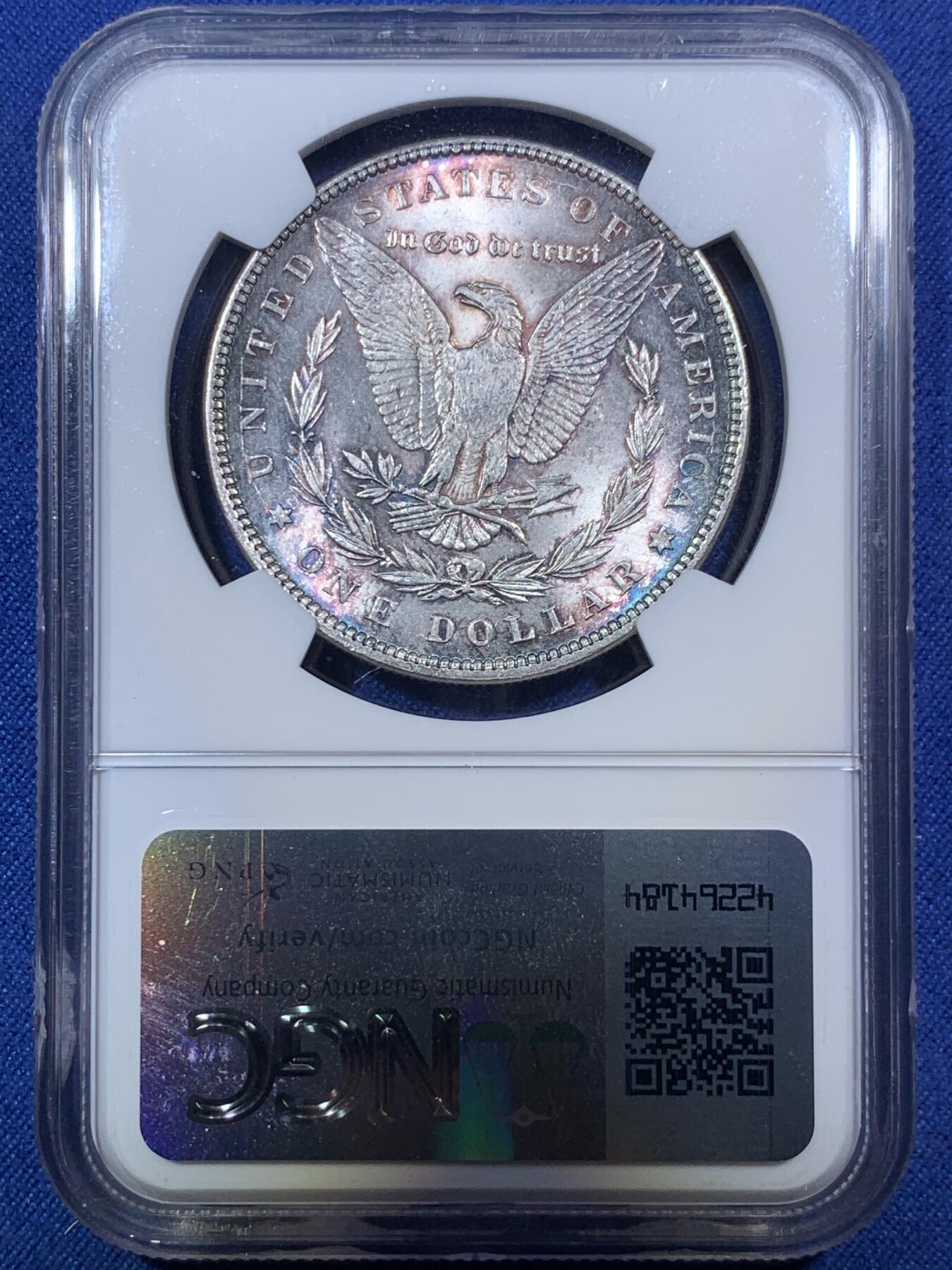 《竞宝斋》第292场- 周日，周一  2场连拍 （全场包邮） NGC MS63 美国1896摩根 绝对低评 包浆非常漂亮 蓝色和紫色交织在币面上 配合闪闪的银光 实属自藏佳品