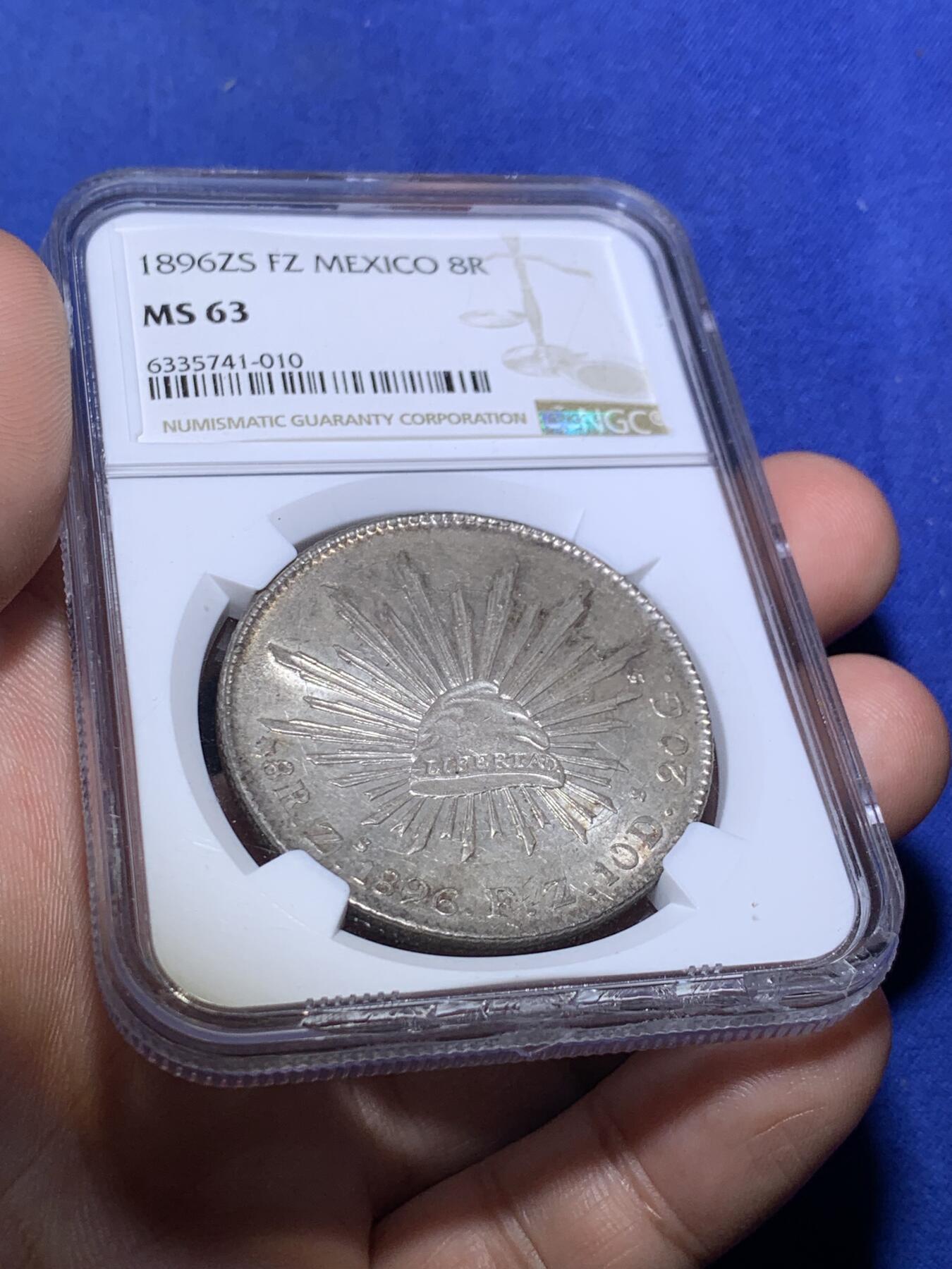 《竞宝斋》第292场- 周日，周一  2场连拍 （全场包邮） NGC MS63 墨西哥1896年ZS版花边鹰洋8瑞尔银币 盒子下沿有损