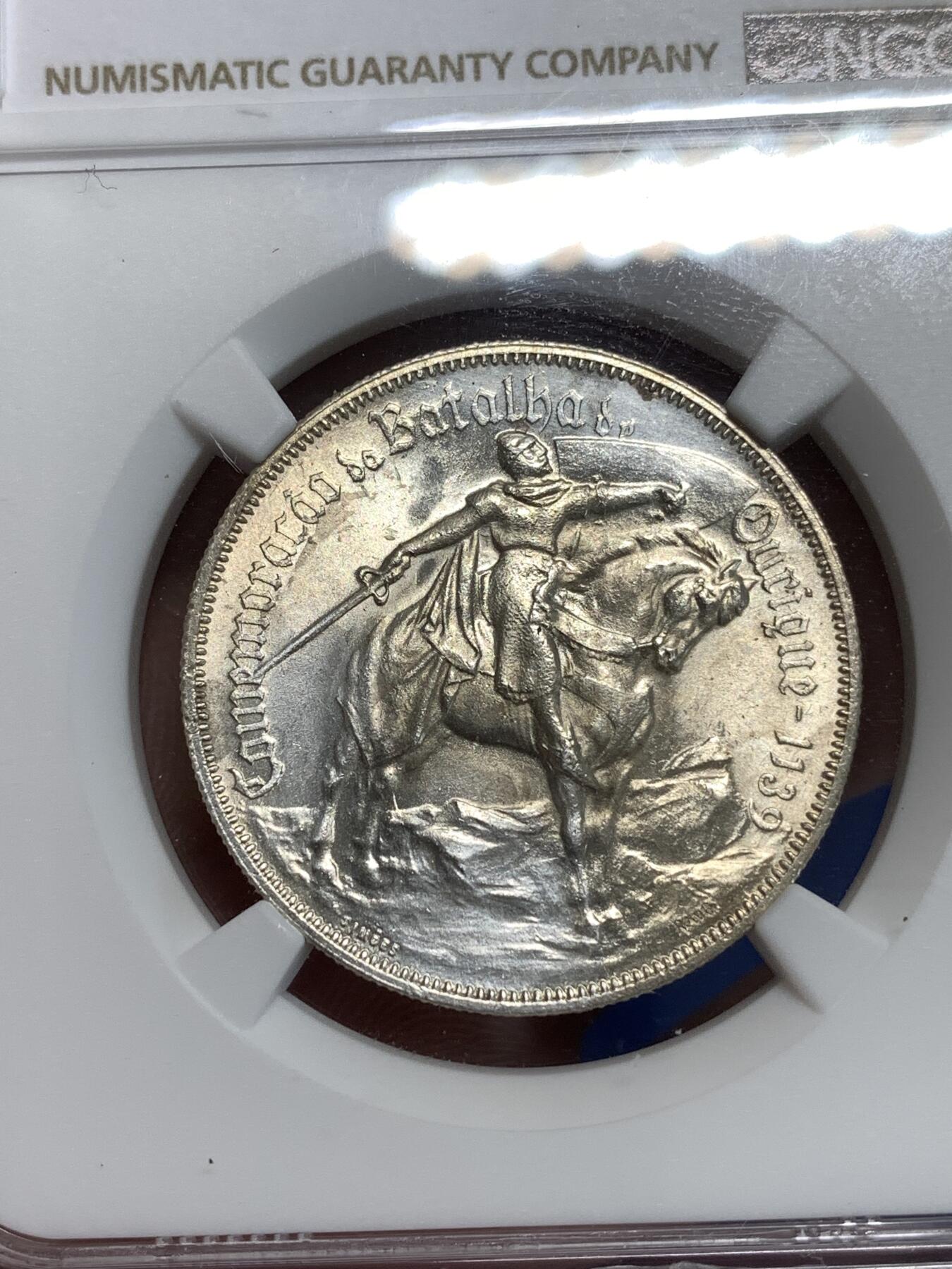 《竞宝斋》第292场- 周日，周一  2场连拍 （全场包邮） NGC UNC 葡萄牙1928年奥里基战役10埃斯库多银币 转光流畅 背部少许浅擦痕迹