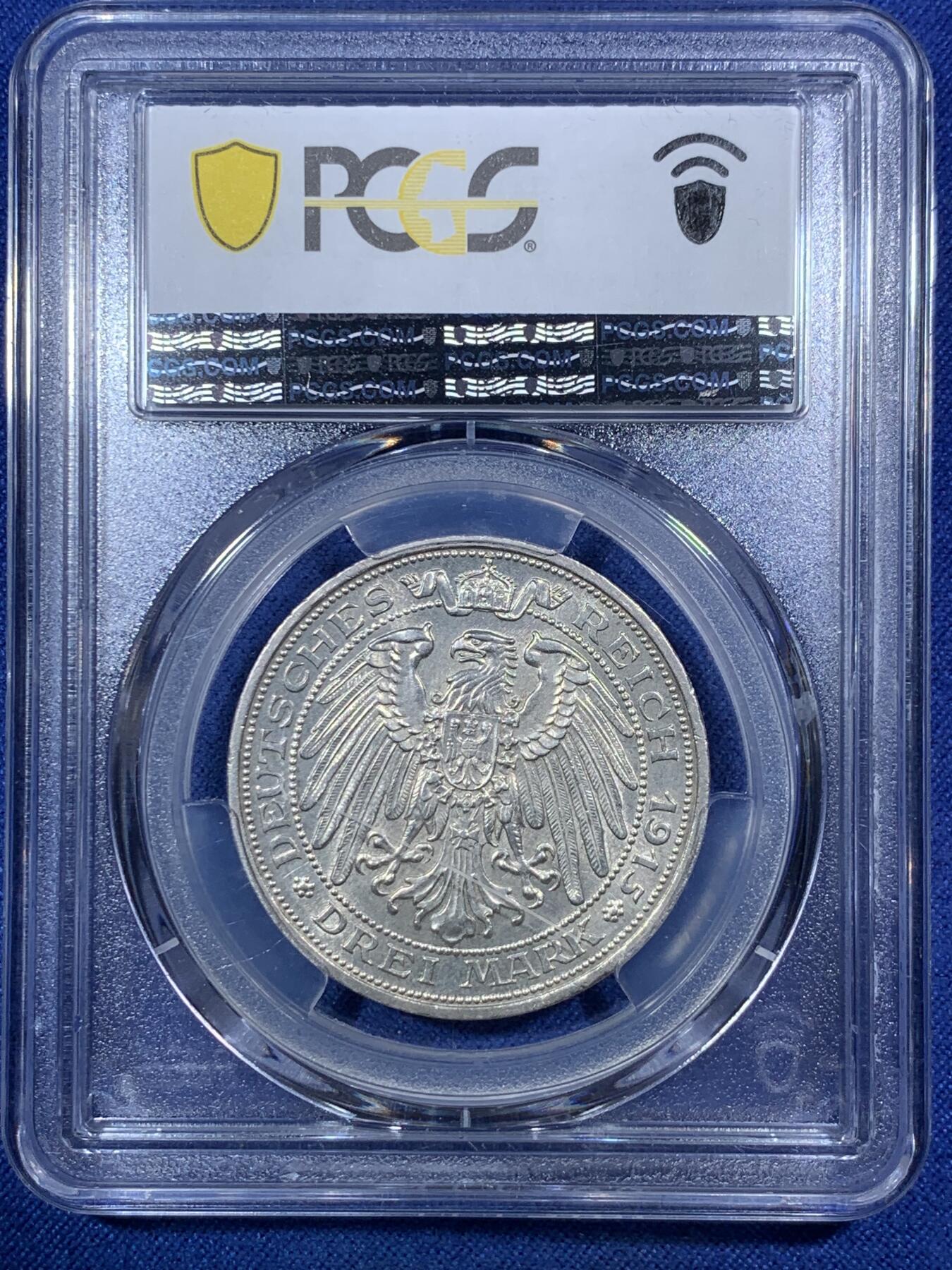 《竞宝斋》第292场- 周日，周一  2场连拍 （全场包邮） PCGS MS64 德国普鲁士1915曼斯菲尔德屠龙3马克银币 背面盒子上有一划痕