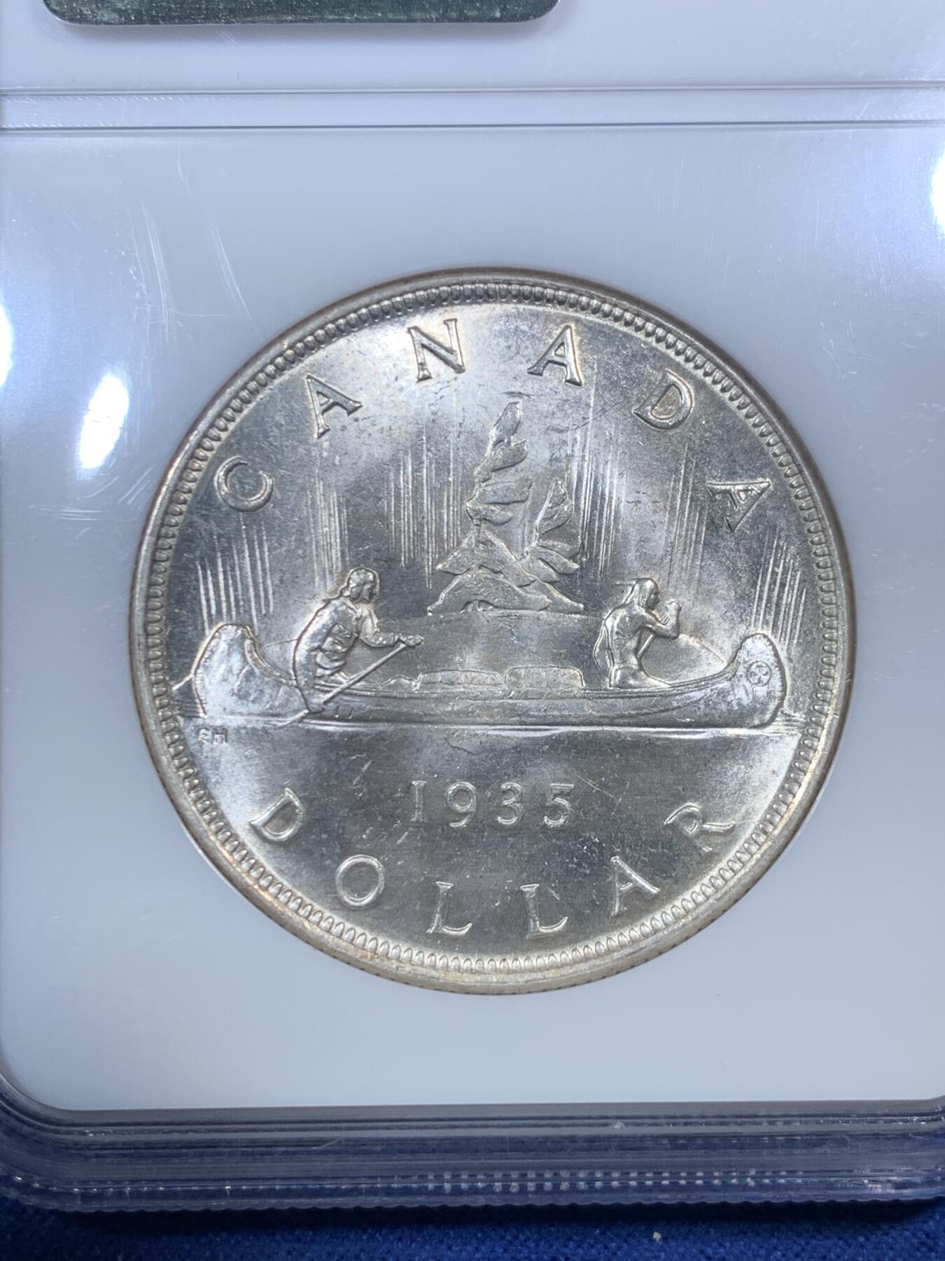 《竞宝斋》第292场- 周日，周一  2场连拍 （全场包邮） NGC MS64 1935年英属加拿大乔五壹元划船纪念银币老盒严评 小白盒不多了全银光 麦稀奇原拍品 成交价1200