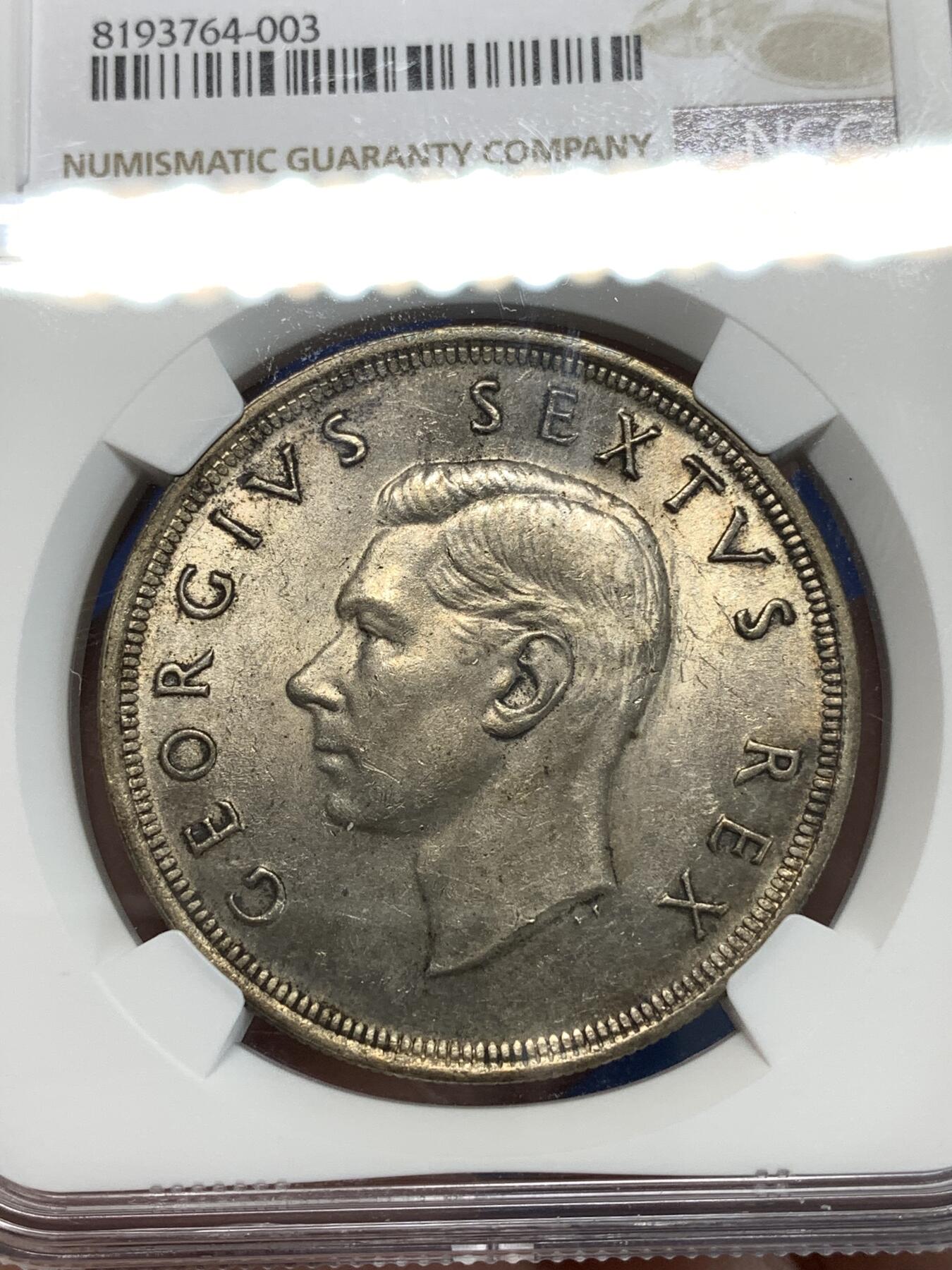 《竞宝斋》第292场- 周日，周一  2场连拍 （全场包邮） NGC MS62 南非1952年5先令大银币 背面带金色彩