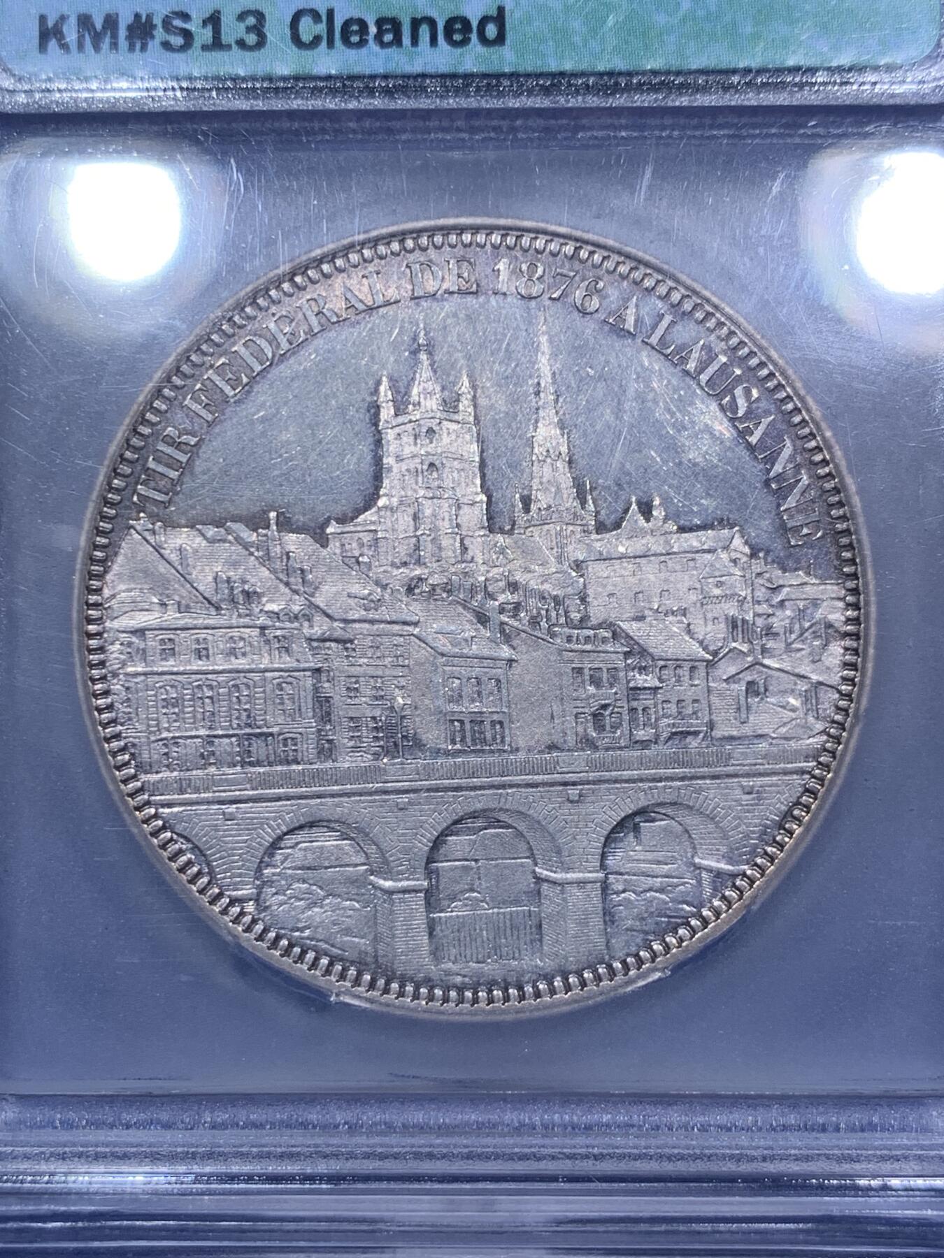 《竞宝斋》第292场- 周日，周一  2场连拍 （全场包邮） ICG MS60（cleaned）瑞士1876瑞士洛桑射击风景5法郎 建筑和桥梁至今仍在