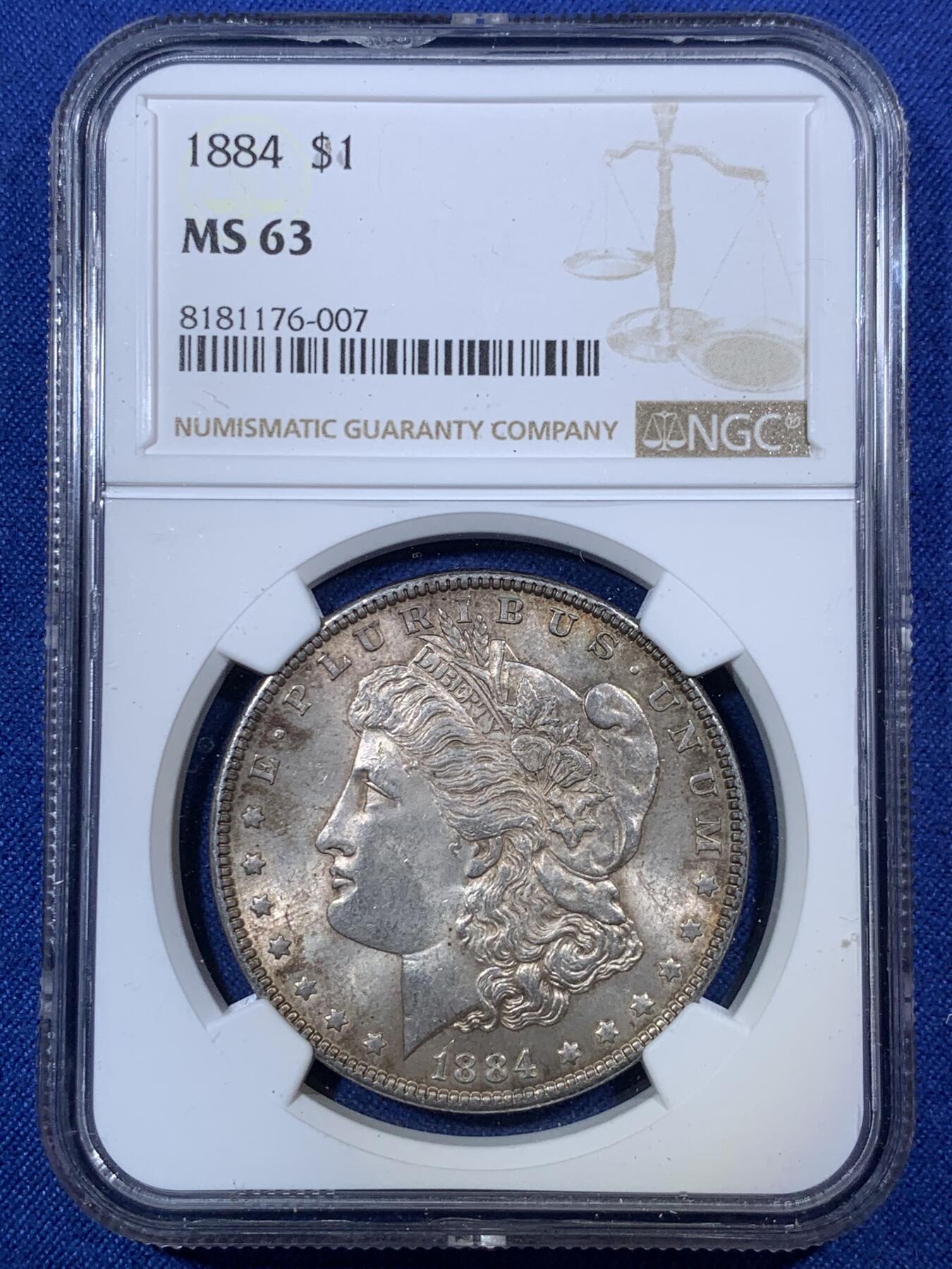 《竞宝斋》第292场- 周日，周一  2场连拍 （全场包邮） NGC MS63 美国1884年P版摩根银币 双面重五彩 小版较为稀有 评级纪录比常见的那些少很多