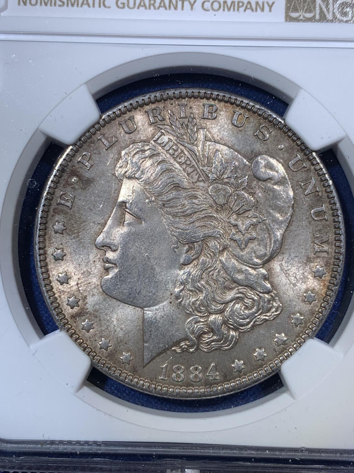 《竞宝斋》第292场- 周日，周一  2场连拍 （全场包邮） NGC MS63 美国1884年P版摩根银币 双面重五彩 小版较为稀有 评级纪录比常见的那些少很多