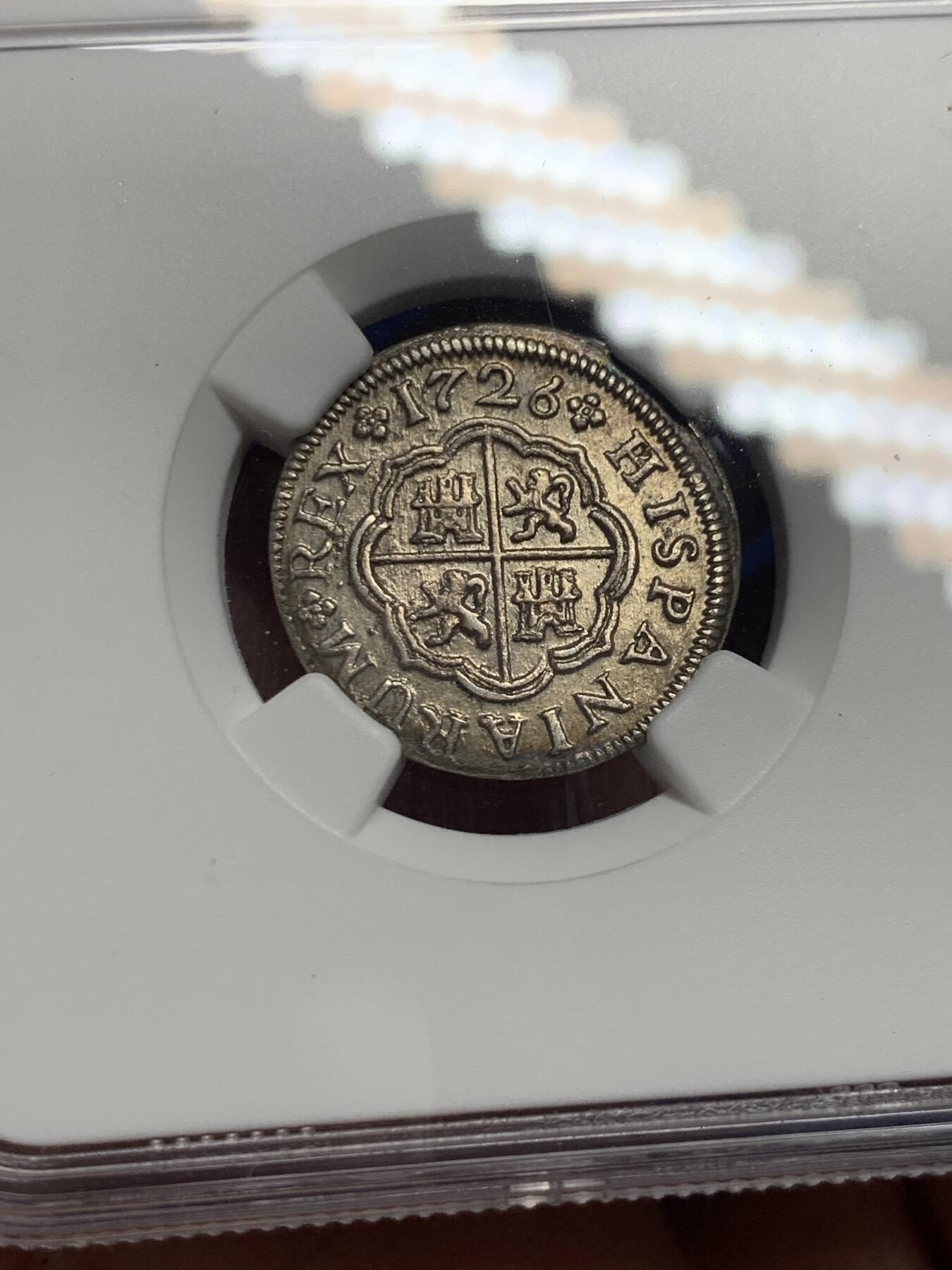 《竞宝斋》第293场- 周日，周一  2场连拍 （全场包邮） NGC AUD 西班牙1726S腓力五世1里亚尔银币 本土十字 少见品种