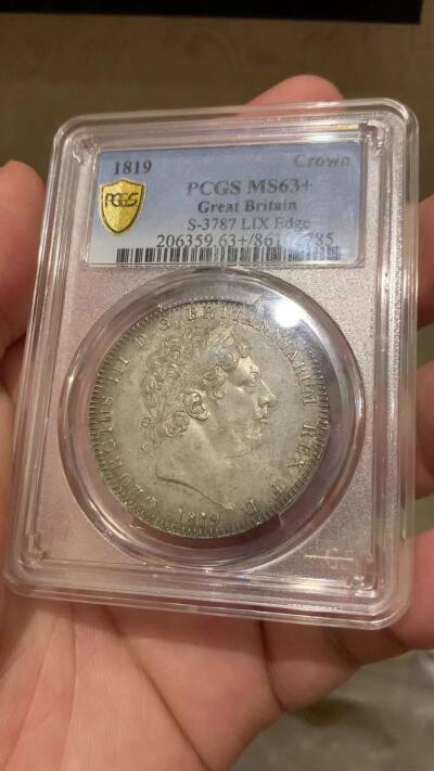 《竞宝斋》第293场- 周日，周一  2场连拍 （全场包邮） 荐！PCGS MS63+ 英国1819年乔治三世马剑克朗银币 难得一见高分味道包浆