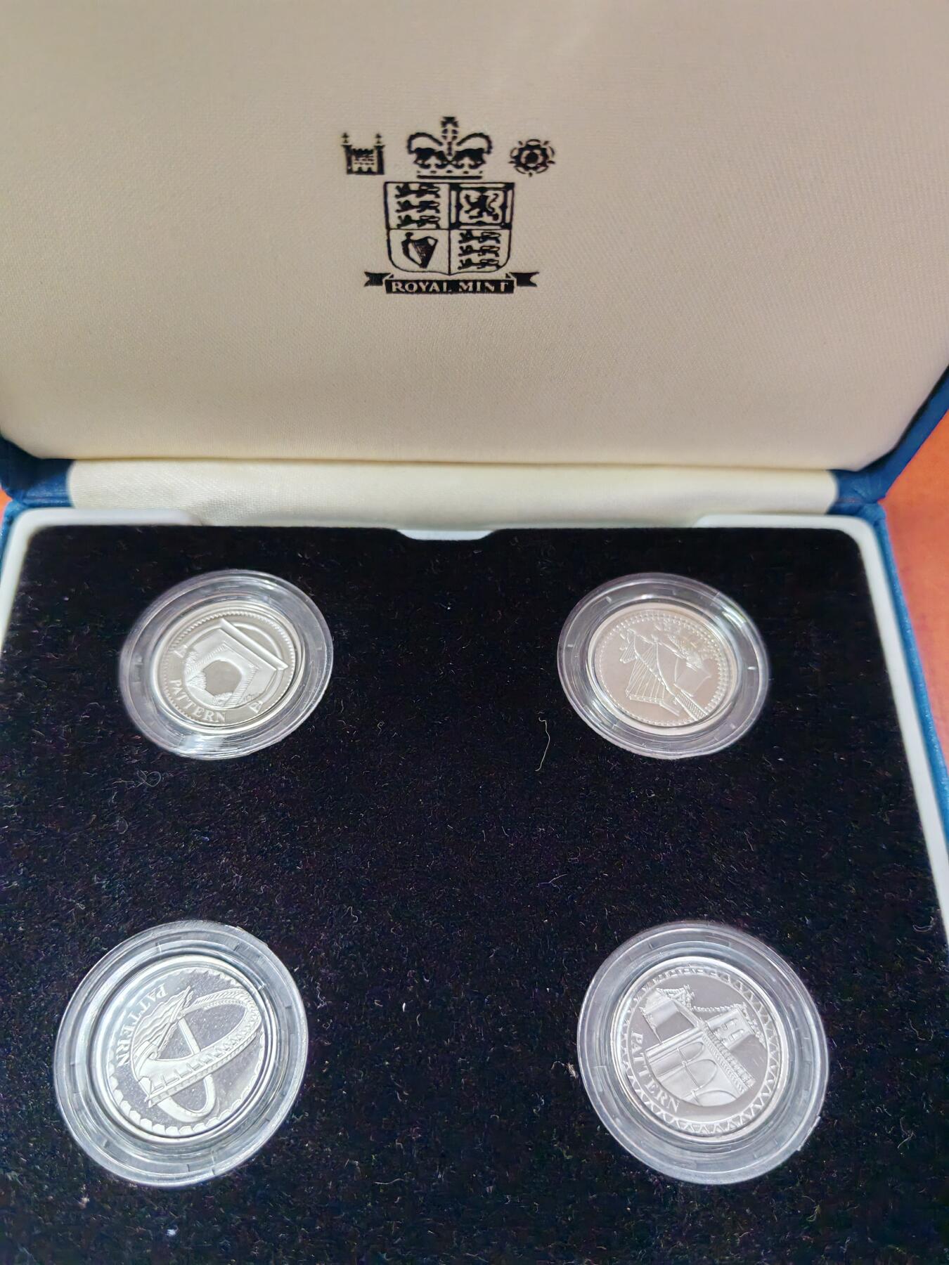 长老汇龙年精选第十四场拍卖 2004-2007英国桥4枚1英镑精制银币yangbi套装，盒证全