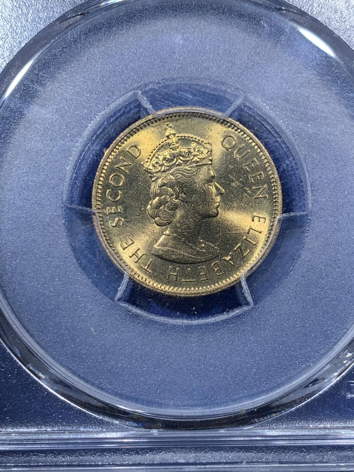 《竞宝斋》第293场- 周日，周一  2场连拍 （全场包邮） PCGS MS65 1980 香港 一毫 特年 这个品种很容易有胶水痕迹 这枚币面干净没有胶水印 非常少见 同时两面都有犀利转光 绝对好品