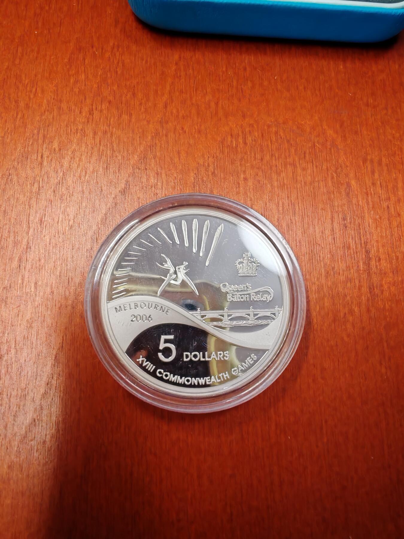 长老汇龙年精选第十五场拍卖 2006澳大利亚墨尔本英联邦运动会5澳元精制银币，盒证全，36.31克999银