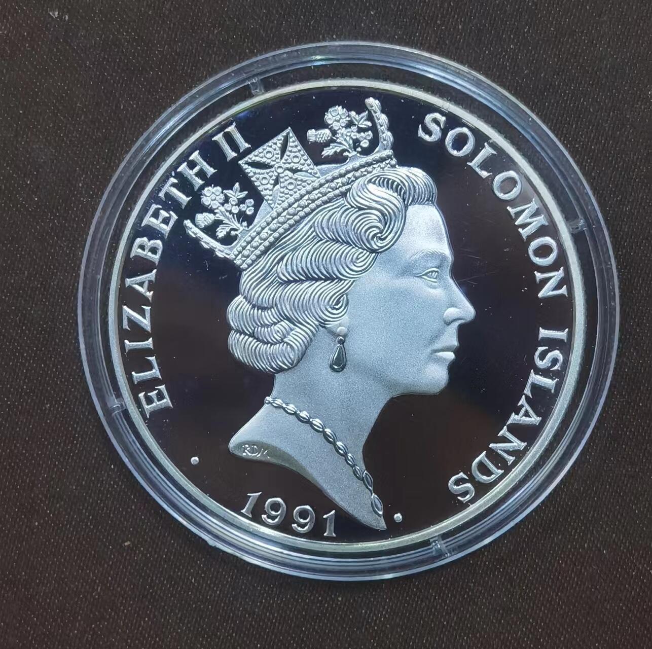 北京马甸外国币专卖微拍第124期，外国金银币专场，陆续上新，欢迎关注  38.6mm 巴塞罗那奥运会 所罗门1991年 10元 纪念银币 31.4g 925 m