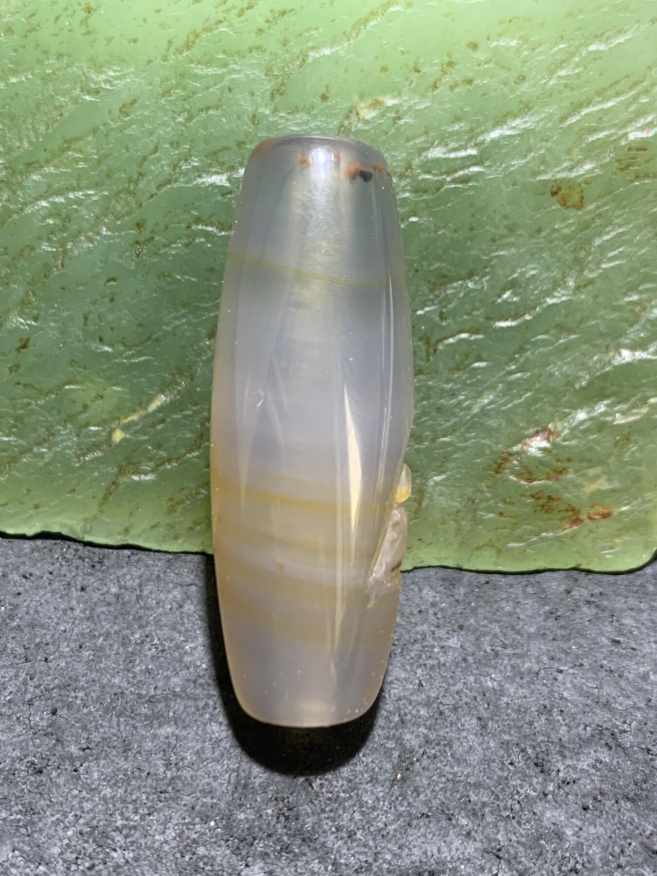 精美亚光高玉化巴西玛瑙手工俏色巧雕无相佛桶珠一个！
