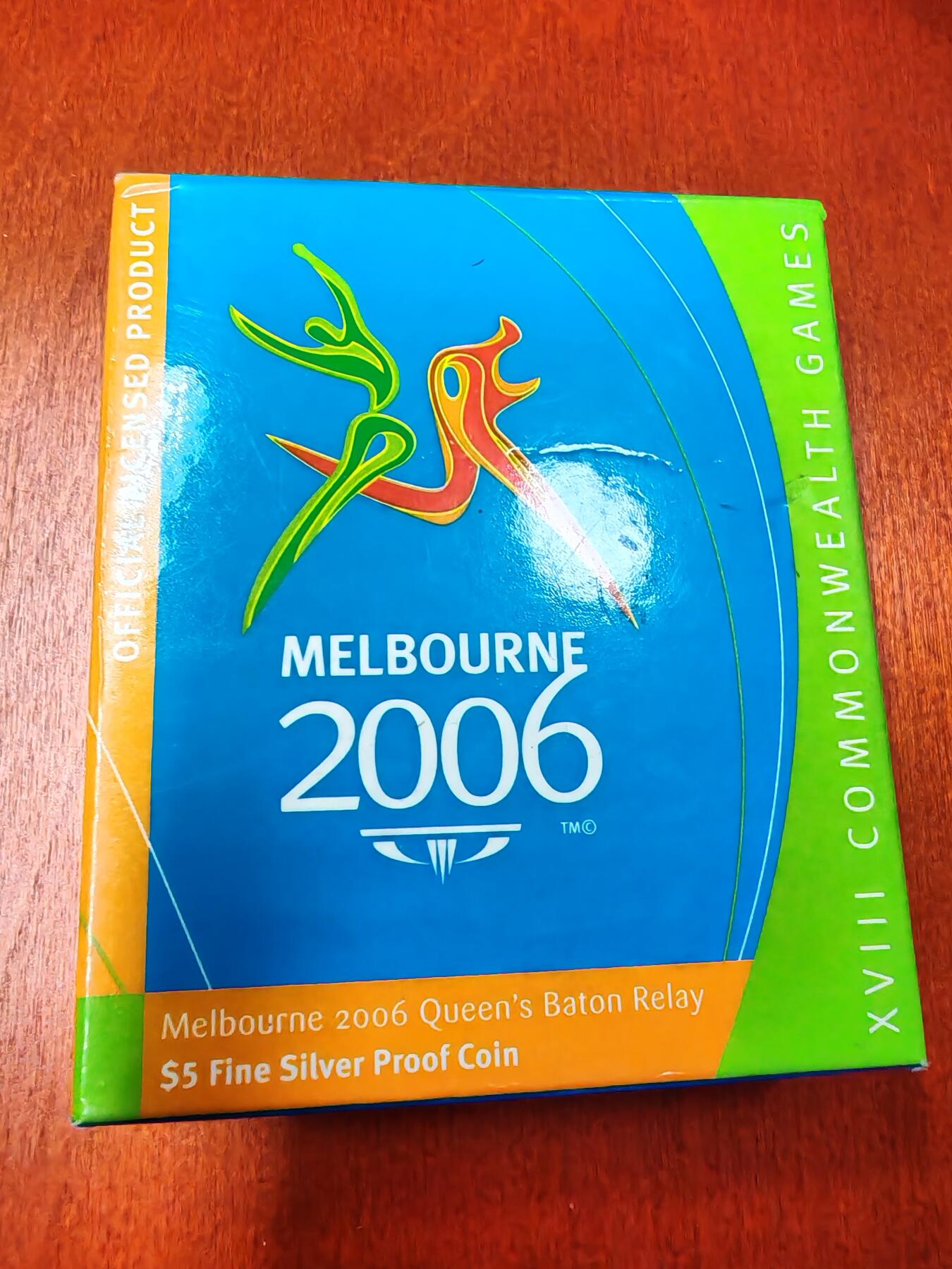 长老汇龙年精选第十五场拍卖 2006澳大利亚墨尔本英联邦运动会5澳元精制银币，盒证全，36.31克999银