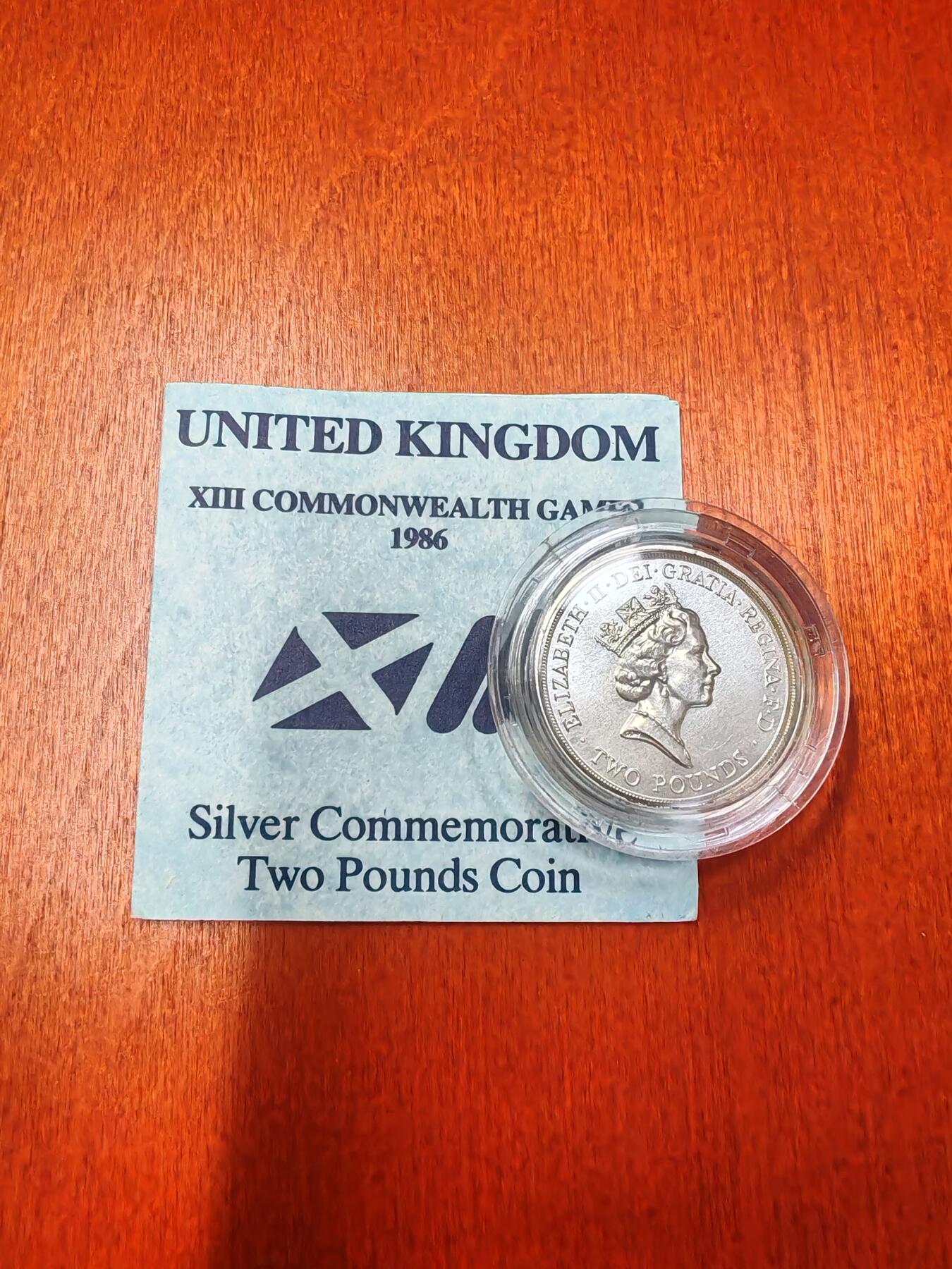 长老汇龙年精选第十六场拍卖 1986英国苏格兰英联邦运动会2英镑银币，盒证全
