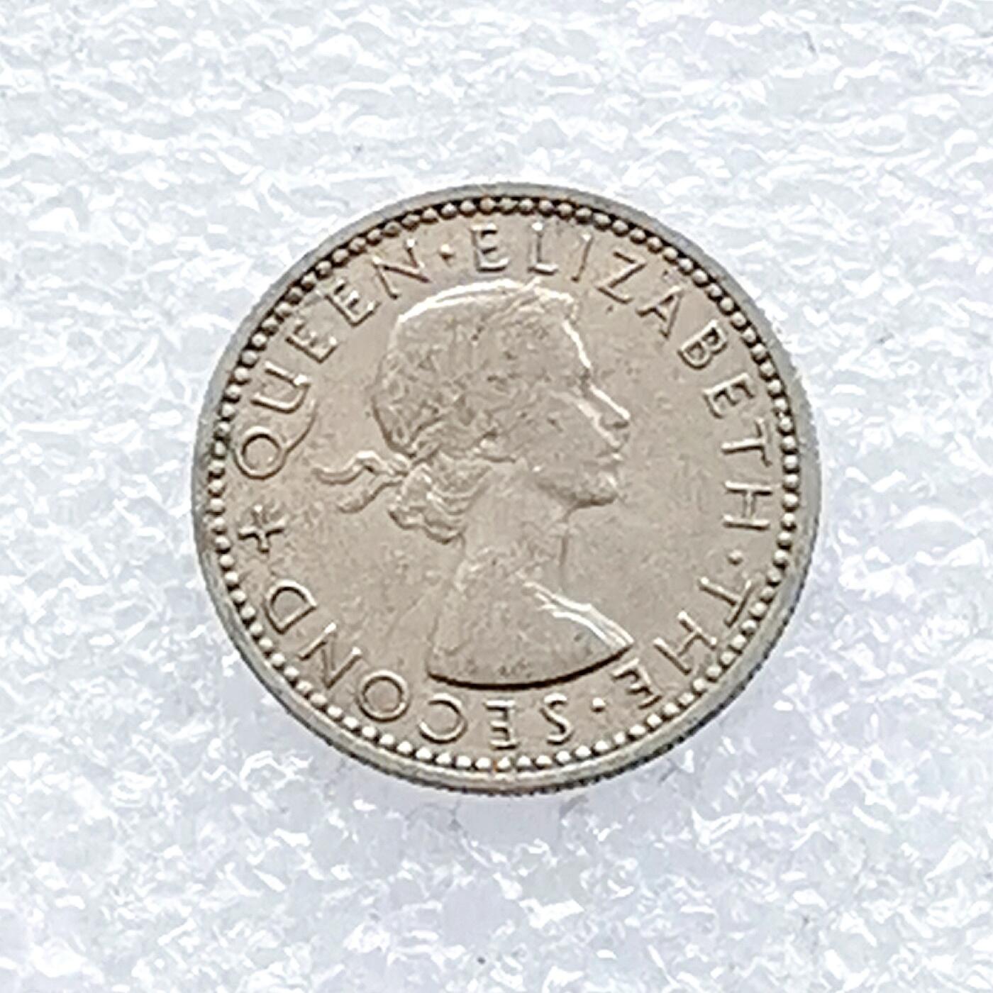 海外回流1元起拍小铺 各国钱币散币场 第14期 1957年英属罗德西亚和尼亚萨兰6便士 猎豹