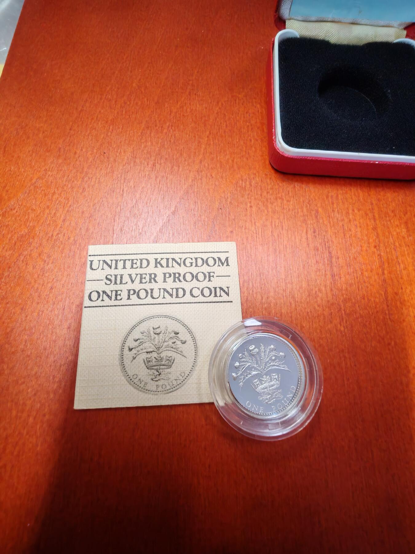 长老汇龙年精选第十六场拍卖 1984英国1英镑精制银币，盒证全