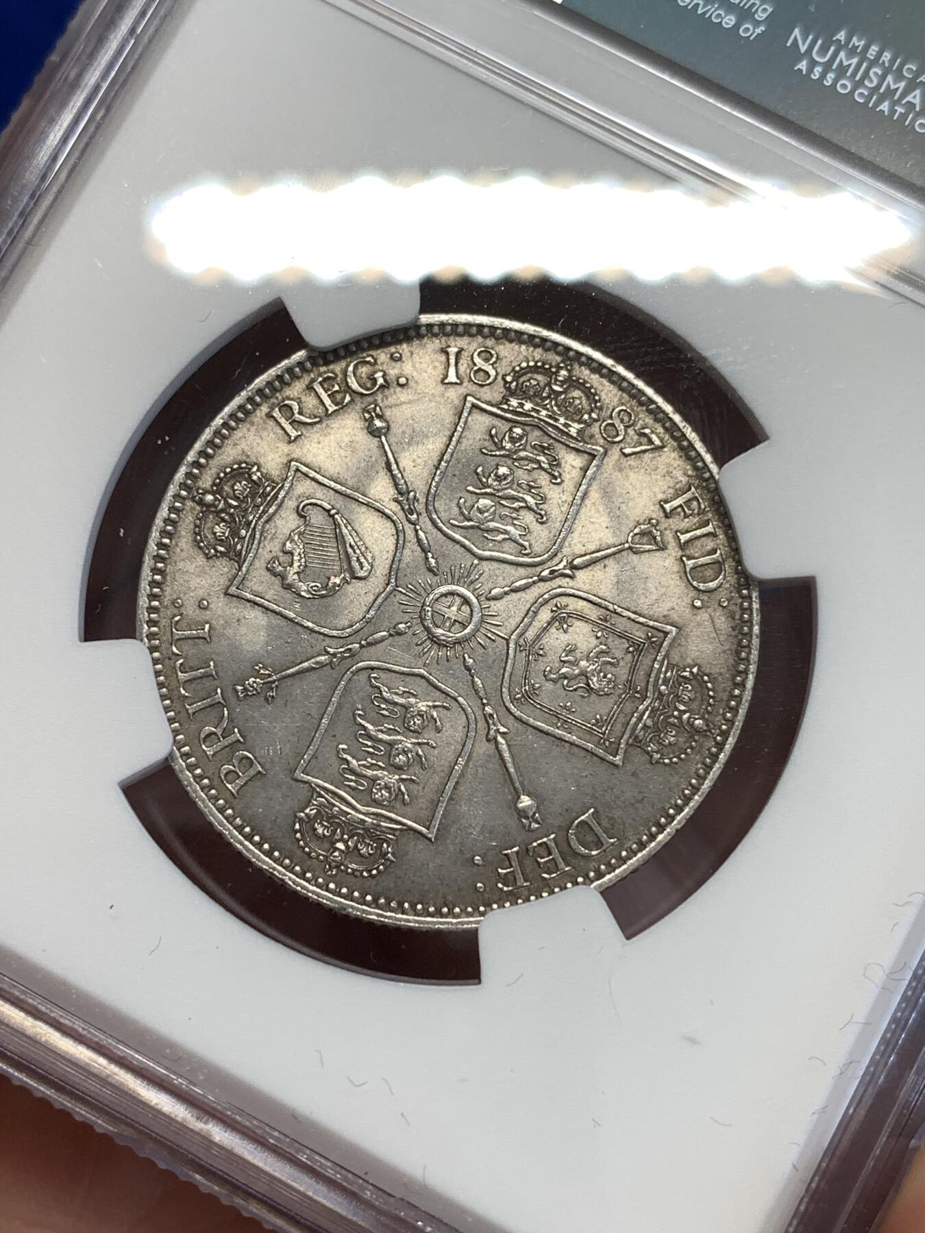 《竞宝斋》第294场- 周日，周一  2场连拍 （全场包邮） NGC UNC 英国1887年维多利亚女王1弗洛林 2先令银币