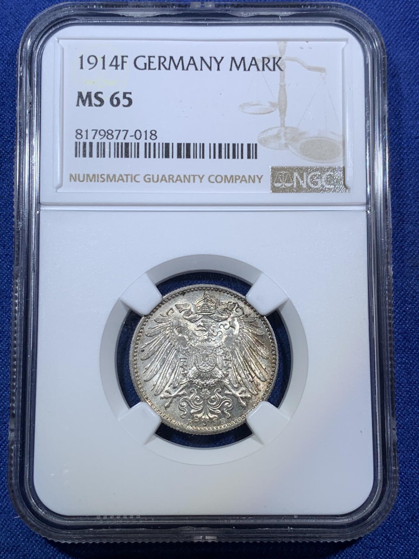 《竞宝斋》第294场- 周日，周一  2场连拍 （全场包邮） NGC-MS65 德国1914-F 1马克银币，转光特猛，浅黄油包浆，脱模剂依稀可见，出厂状态。